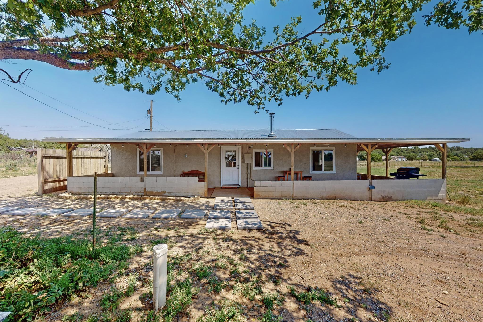 Mountain home with over 7 fully-fenced acres. Equine ready, expansion or custom build. Escape to the mountains and discover the freedom of wide-open space with this unique property. Whether you're looking for a tranquil homestead or a base for your mountain lifestyle, this property offers incredible flexibility and opportunity.