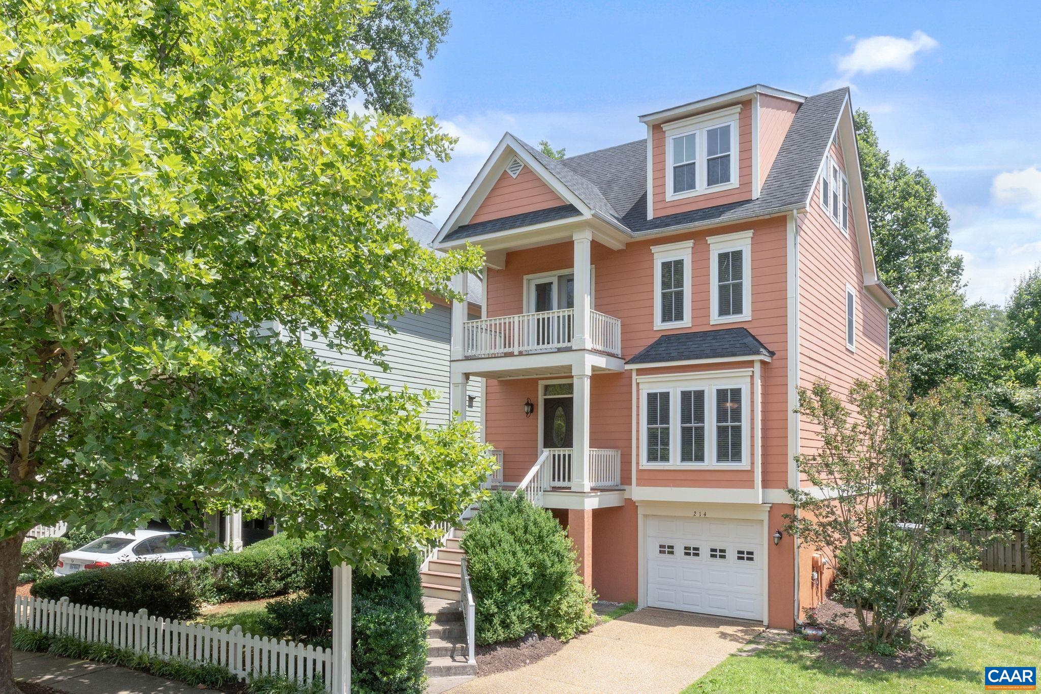 Welcome to Huntley—a charming, tree & white picket fenced-lined community in the heart of Fry’s Spring, just over a mile from UVA Hospital & Scott Stadium. This move-in ready home offers a flexible floor plan across four finished levels, including a stunning attic renovation with southwest mountain views, custom window nook with built-in daybed, a bedroom, full bath, & dedicated mini-split HVAC. The terrace level features a spacious media/flex room with built-in speakers, full bath, & walk-out access to a covered patio, & shaded, fenced backyard oasis. The main level boasts 9' ceilings, gas fireplace, custom kitchen hood range (2020) & an expansive east-facing TimberTech AZEK deck (flooring & top rails installed 2020) perfect for morning coffee or evening relaxation. The primary suite includes a walk-in closet with wood shelves, its own covered porch, & ensuite bath. Other noteworthy features include rich hardwood flooring, wonderful storage, & spray foam insulation. Major system updates include dual Carrier HVACs with UV lamps (2019 & 2021), new water heater (2025), & interior painting (2025). HOA covers yard maintenance. Close to trails, dining, & UVA, this home blends comfort, convenience, & charm.