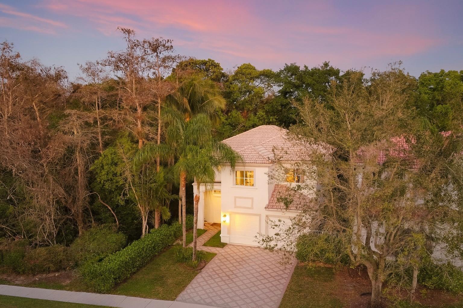 Located in West Boca Raton, FL, the remarkable residence known as ''the Jungle House'' is a luxurious sanctuary that beautifully merges sophisticated living with the tranquility of nature. This unique home features 4 bedrooms, 3 full baths, and encompasses a total living space of 2648 sq.ft.Upon entering, visitors are greeted by elegant dark hardwood floors that establish a tone of refined luxury, extending throughout the home. The main living area is accentuated with a contemporary fireplace, offering a cozy ambiance for relaxation or entertaining. Adjacent to this, the dining room provides an inviting space for meals, while the kitchen and family room serve as the heart of the home for gathering. A fourth bedroom and a full hall bath​​‌​​​​‌​​‌‌​‌‌‌​​‌‌​‌‌‌​​‌‌​‌‌‌ are conveniently located on the main level for guests or additional family members.

The master bedroom, an expansive 800 sq.ft suite located on the second floor, features a large walk-in closet and a master bath with a freestanding tub and marble finishes from floor to ceiling, reminiscent of the opulence found at a luxury hotel. Two additional bedrooms, a hall bath, and a laundry room complete the second floor, offering functional and comfortable living spaces.

The home's outdoor area is a true oasis, highlighted by a heated pool with a Bali-inspired sun deck. This serene retreat, influenced by the architectural elegance of Addison Mizner, provides the perfect setting for soaking in the Florida sunshine or enjoying a peaceful swim amidst lush greenery. The house sits next to an acre preserve on one side, and a 5 acre private property on the other, making this one of the most private lots in a community in Boca Raton.

A quaint putting green adjacent to the house offers residents the opportunity for leisurely golf practice or friendly games in the privacy of their own backyard, adding a touch of playful luxury.

The property also features a spacious 2-car garage, ensuring ample space for vehicles and storage. This addition enhances convenience and security, making the Jungle House a highly sought-after property in Boca Raton.

With every detail thoughtfully designed to deliver unmatched luxury and comfort, the Jungle House stands as a testament to exquisite living in Florida, offering a private jungle retreat within one of the state's most desirable locations.

Located in West Boca Raton, FL, the remarkable residence known as "the Jungle House" is a luxurious sanctuary that beautifully merges sophisticated living with the tranquility of nature. This unique home features 4 bedrooms, 3 full baths, and encompasses a total living space of 2648 sq.ft.

Upon entering, visitors are greeted by elegant dark hardwood floors that establish a tone of refined luxury, extending throughout the home. The main living area is accentuated with a contemporary fireplace, offering a cozy ambiance for relaxation or entertaining. Adjacent to this, the dining room provides an inviting space for meals, while the kitchen and family room serve as the heart of the home for gathering. A fourth bedroom and a full hall bath are conveniently located on the main level for guests or additional family members.

The master bedroom, an expansive 800 sq.ft suite located on the second floor, features a large walk-in closet and a master bath with a freestanding tub and marble finishes from floor to ceiling, reminiscent of the opulence found at a luxury hotel. Two additional bedrooms, a hall bath, and a laundry room complete the second floor, offering functional and comfortable living spaces.

The home's outdoor area is a true oasis, highlighted by a heated pool with a Bali-inspired sun deck. This serene retreat, influenced by the architectural elegance of Addison Mizner, provides the perfect setting for soaking in the Florida sunshine or enjoying a peaceful swim amidst lush greenery. The house sits next to an acre preserve on one side, and a 5 acre private property on the other, making this one of the most private lots in a community in Boca Raton.

A quaint putting green adjacent to the house offers residents the opportunity for leisurely golf practice or friendly games in the privacy of their own backyard, adding a touch of playful luxury.

The property also features a spacious 2-car garage, ensuring ample space for vehicles and storage. This addition enhances convenience and security, making the Jungle House a highly sought-after property in Boca Raton.

With every detail thoughtfully designed to deliver unmatched luxury and comfort, the Jungle House stands as a testament to exquisite living in Florida, offering a private jungle retreat within one of the state's most desirable locations.