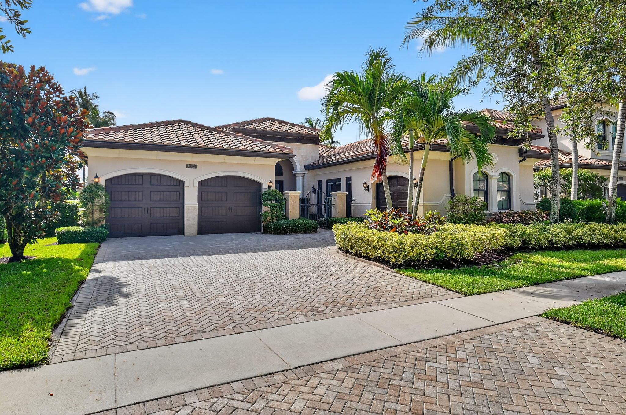 Step into refined luxury in this fully furnished, custom-furnished, designer-upgraded residence located in the prestigious community of The Bridges. Offering 3 bedrooms, 3.5 bathrooms, and a custom clubroom/office, this exceptional home seamlessly blends sophisticated style with modern convenience. A private courtyard entry with etched glass double doors leads to a welcoming foyer, setting the tone for the elegance found throughout. Step into a grand living area featuring gleaming marble floors, impact windows and doors, soaring coffered ceilings, surround sound, and crown molding throughout. The living room is enhanced by a custom wet bar and striking white stone columns, while newly installed oversized sliding glass doors with transom glass panels bathe the space in natural light. The formal dining area offers a refined setting, perfect for hosting gatherings and special occasions.
The 2024-updated kitchen is a chef's dream, featuring white stacked cabinetry, quartz countertops, tiled backsplash, under-cabinet lighting, Sub-Zero refrigerator, Viking cooktop and double ovens, Bosch dishwasher, center island with Viking microwave, walk-in pantry, snack bar, and a charming breakfast nook.

The primary suite is a true sanctuary, complete with a sitting area, built-in coffee bar, private patio access, and brand new custom walk-in closets. The luxurious primary bath impresses with a double door entrance, updated floating vanities, marble countertops, upgraded lighting, soaking tub, and a walk-in rain shower.

Two additional en-suite bedrooms offer comfort and privacy. The newly reimagined clubroom/office showcases sleek marble flooring and a custom-built desk, ideal for work or relaxation.

The laundry room has been upgraded with new cabinets and quartz counters, adding function and flair. Security is top-of-mind with fully alarmed windows and doors throughout.

Enjoy resort-style living in your tropical backyard retreat, complete with new clusia hedges, lush custom landscaping, and tailored outdoor lighting. A covered patio, fenced yard, and tranquil water views create the perfect setting for outdoor enjoyment.

Additional features include a 3-car garage with brand new Polyaspartic epoxy flooring.

Live the lifestyle you deserve this home in The Bridges offers an unmatched blend of elegance, innovation, and comfort.