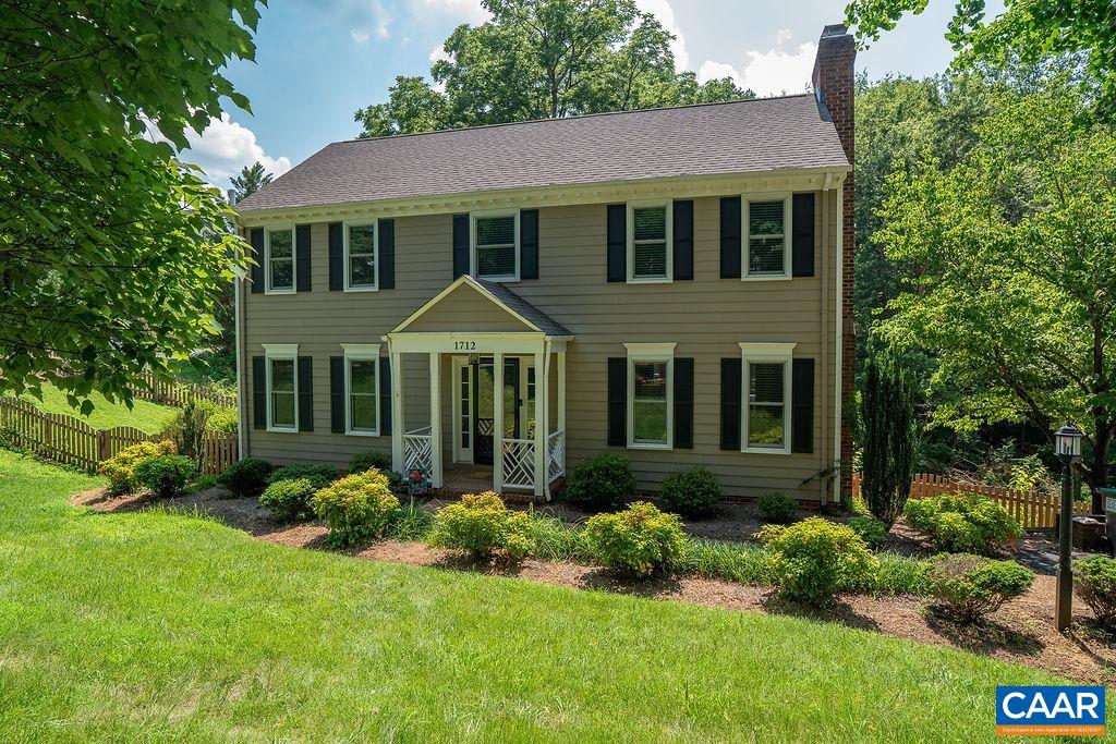 Enjoy the best of both worlds—peaceful county living just minutes from Downtown Charlottesville. This light-filled home features four spacious bedrooms upstairs, with a fifth bedroom and family/rec room in the finished basement for hobbies, or a private retreat. Freshly painted throughout, this home boasts two cozy fireplaces, a screened-in covered porch, and generous living spaces designed for comfort and entertaining. Conveniently located near shopping, dining, schools, and more, this home offers the ideal blend of convenience and accessibility.  Currently leased for 4 years.
