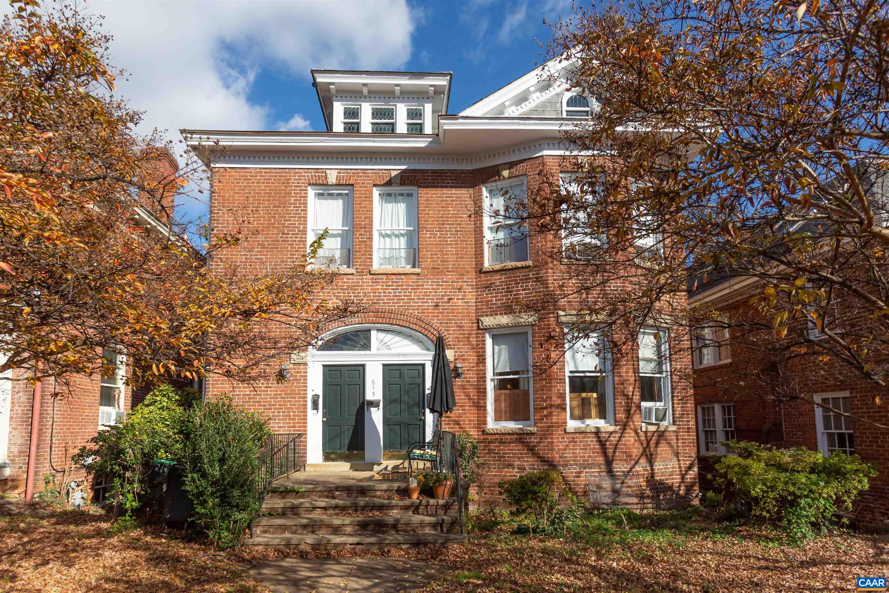 A rare investment opportunity on East High St in the heart of Charlottesville. This stately circa 1925 brick building sits steps from Court Square and the Downtown Mall, offering exceptional walkability to dining, shopping, and all that downtown has to offer. Currently configured as three residential units, the property offers strong income potential and could easily transition into office or mixed-use space. Just minutes from the University of Virginia and surrounded by law firms, medical offices, and historic landmarks, this location supports a wide range of possibilities. Architectural details include high ceilings, heart pine floors, stone jack arches, and 7-course American bond brickwork. Investors may also benefit from Rehabilitation Tax Credits through the Virginia Department of Historic Resources. Whether you're seeking long-term rental income, a live-work conversion, or a strategic commercial foothold in one of Charlottesville’s most established corridors—this property delivers.
