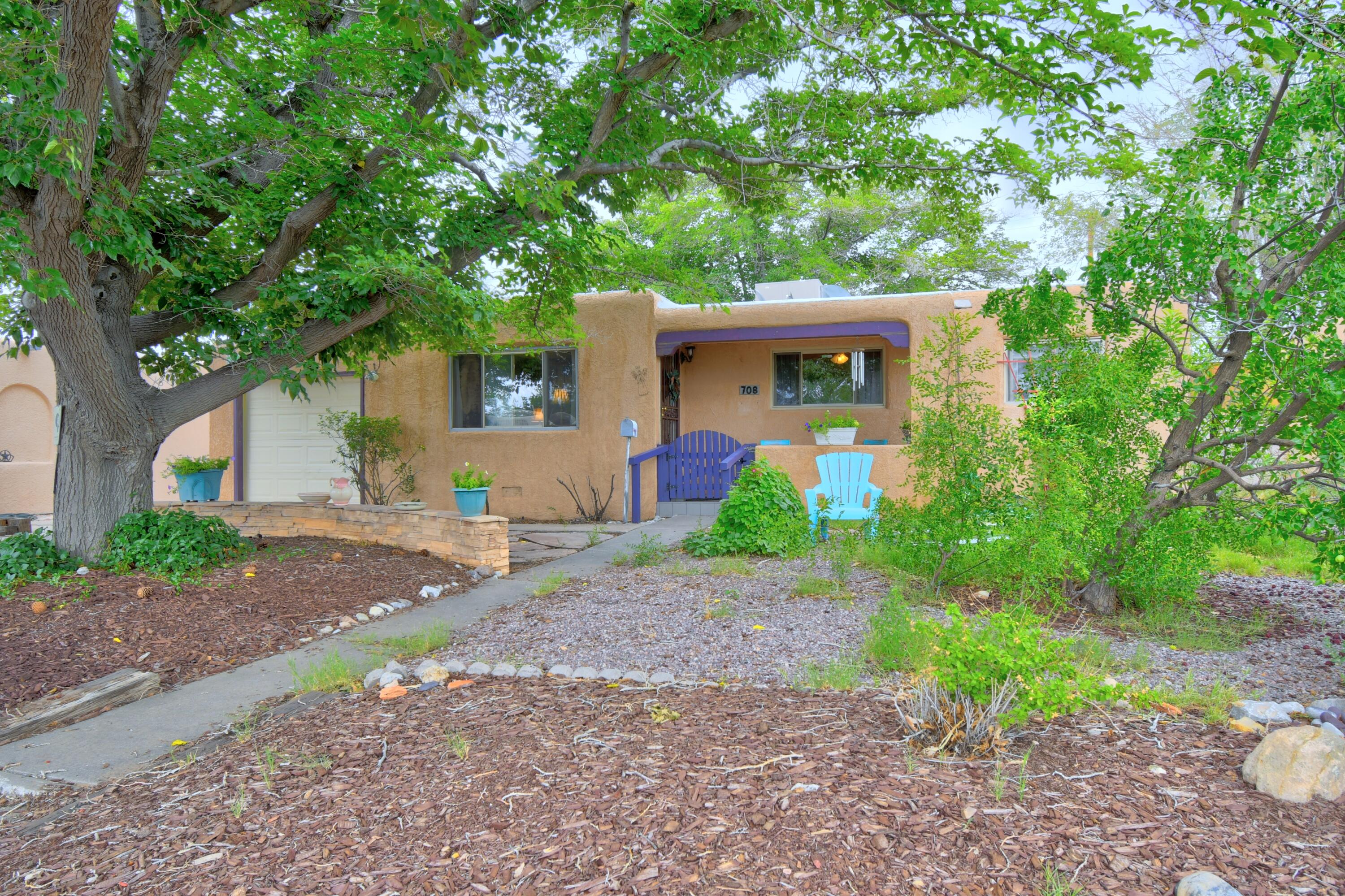 New PVC plumbing, newer Roof, water heater, faucets. Double pane windows! Landscaped front yard,  back yard has huge deck with ramp under a lovely Mulberry tree for shade all day long, covered patio and 2 large Sheds with electric already connected for workshop or storage. Access from back alley into back yard, and nice dog run already set up. Original wood floors in main areas. Kitchen needs some love but very functional and separate laundry room. Walkable to schools for all grade levels. Convenient and safe street, all homes are owned and great neighbors!