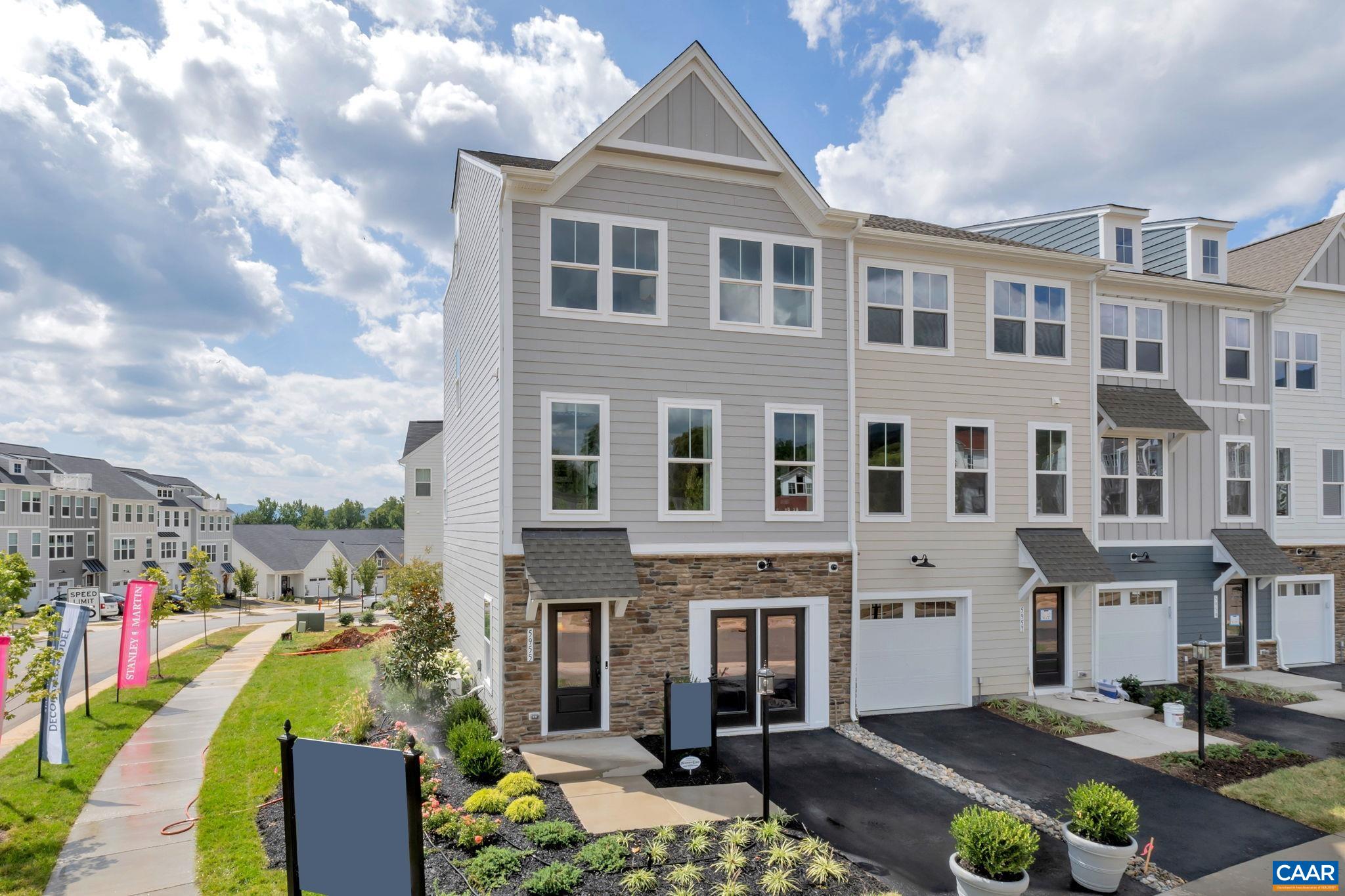 Private Corner End-Unit, New-Construction Garage Townhome with double Primary Suites and no other homes behind it! The open-concept Main Level with 9’ ceilings and Luxury Plank Flooring throughout gets great light and was clearly designed for Hosting. The Living Room can accommodate that sectional you’ve had your eye on, the Dining Area has plenty of space for Dinner Parties, double pantries let you bulk up on snacks, and the 10’ white quartz Kitchen Island gives you extra seating space and plenty of prep area to show off your cooking skills with the help of new GE Appliances! Take the party outside on the 10’X17’ Deck or feel the grass under your feet as you play in the backyard. Inside, you’ll find 2 large Bedroom Suites with attached baths – one extra-private Lower-Level Suite with back yard access and another on the Bedroom Level, steps from Laundry and down the Hall from 2 bedrooms and a third Full Bath. This Suite will become your personal retreat, with a walk-in Closet, space for a King Bed, and double-quartz-vanity bath with gorgeous ceramic tile floors and seat in the shower for luxuriating in the steam at the end of a long day. Estimated early Fall completion. Visit us today! Photos from previously built similar homes