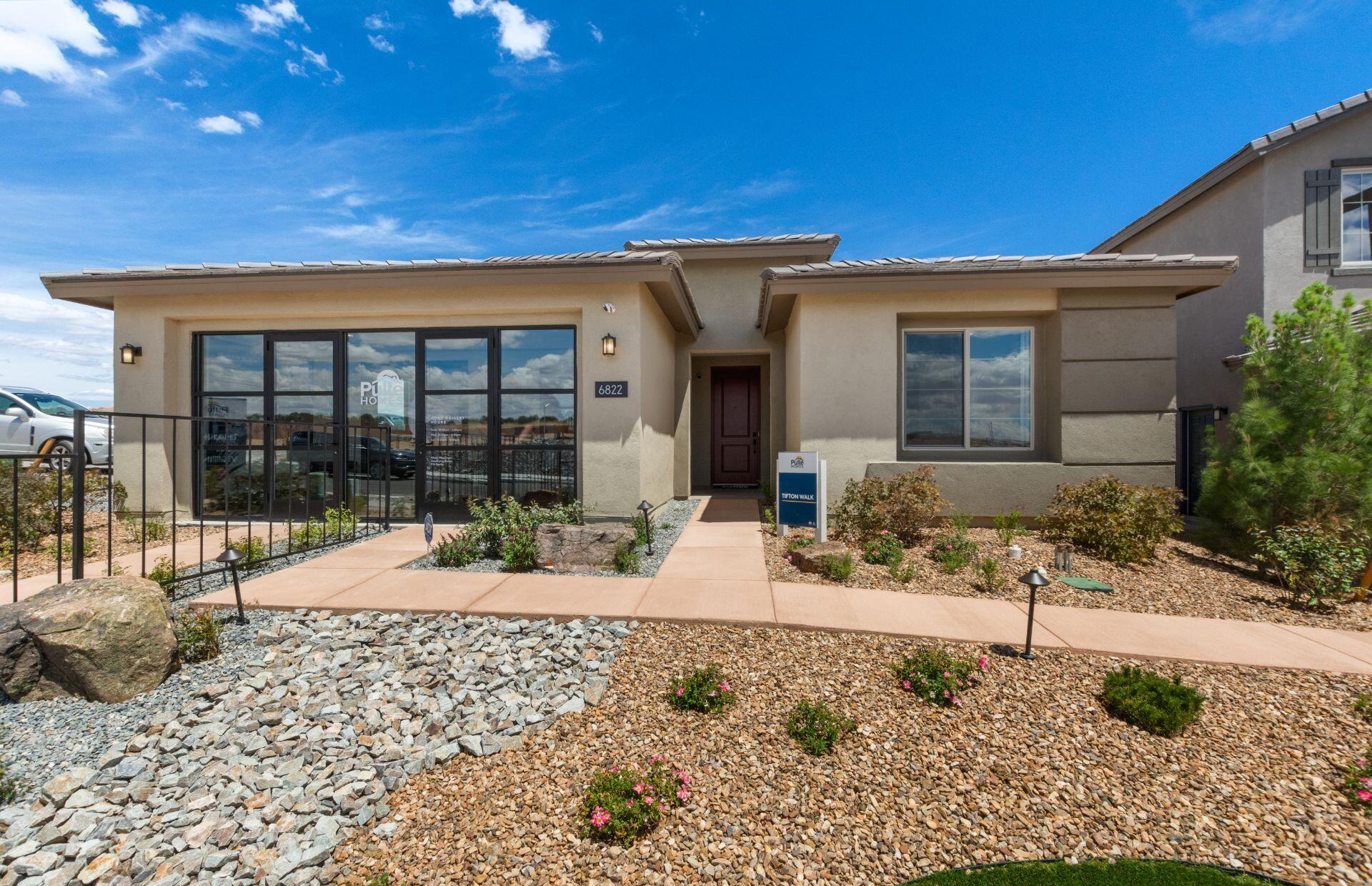 Ready in October.  Beautiful Lomas Encantadas Model is now for sale. Kitchen Aid appliances, walk in pantry, custom window dressings, accent walls, and low maintenance landscaping. Dark kitchen cabinets and Calcutta Gold L6 quartz countertops in gorgeous kitchen. Dual sliding doors to roomy patio. Over sized garage with AC/heat newer unit. Close to schools, dining, shopping, groceries and golf courses.