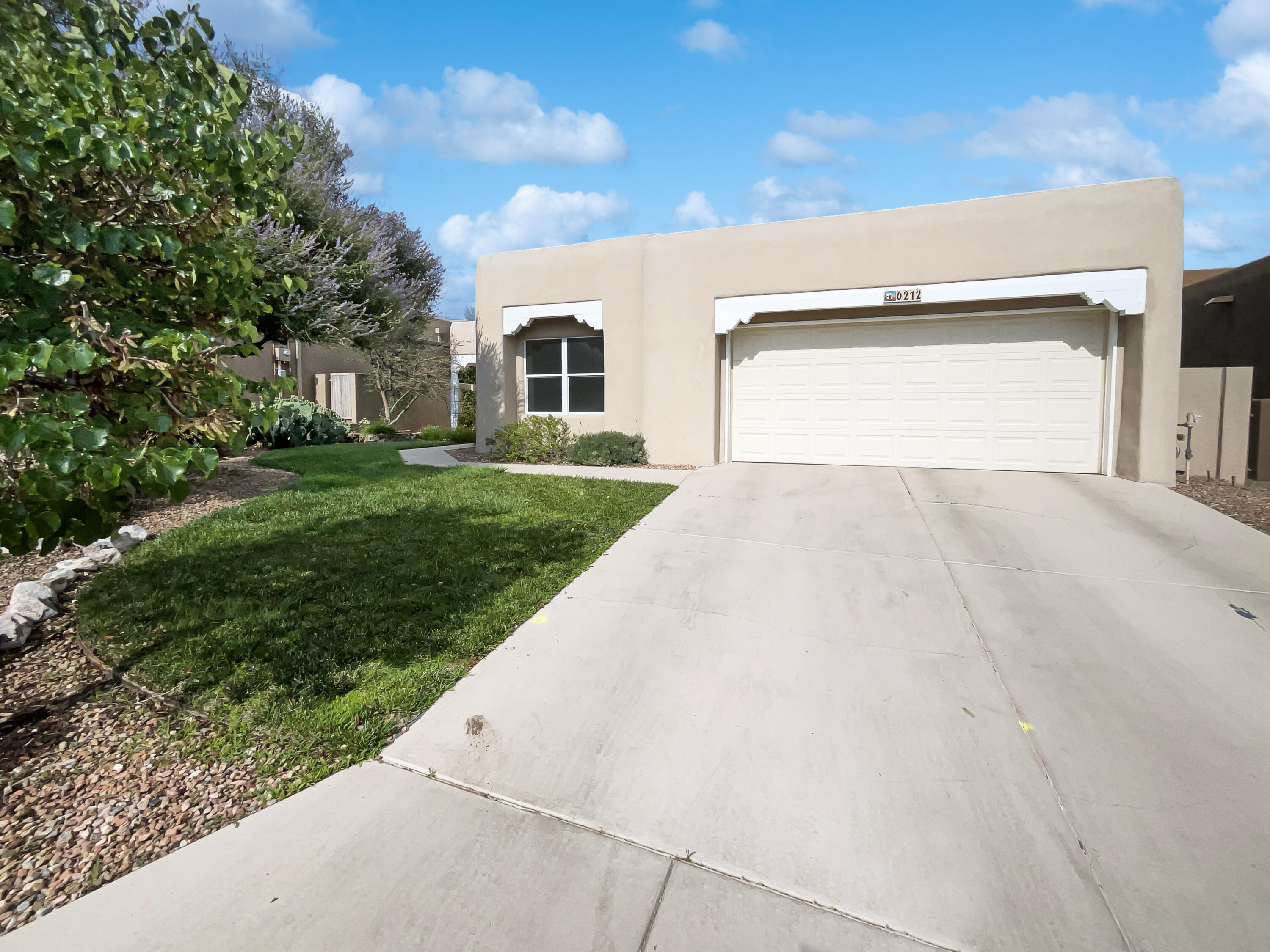 Santa Fe style home in High Desert on a private culdesac. Fantastic home in sought after location!  A fireplace and a soft neutral color palette create a solid blank canvas for the living area. Step into the kitchen, complete with an eye catching stylish backsplash. The primary bathroom is fully equipped with a separate tub and shower, double sinks. Take it easy in the fenced in back yard. The covered sitting area makes it great for BBQs! A must see!. 100-Day Home Warranty coverage available at closing