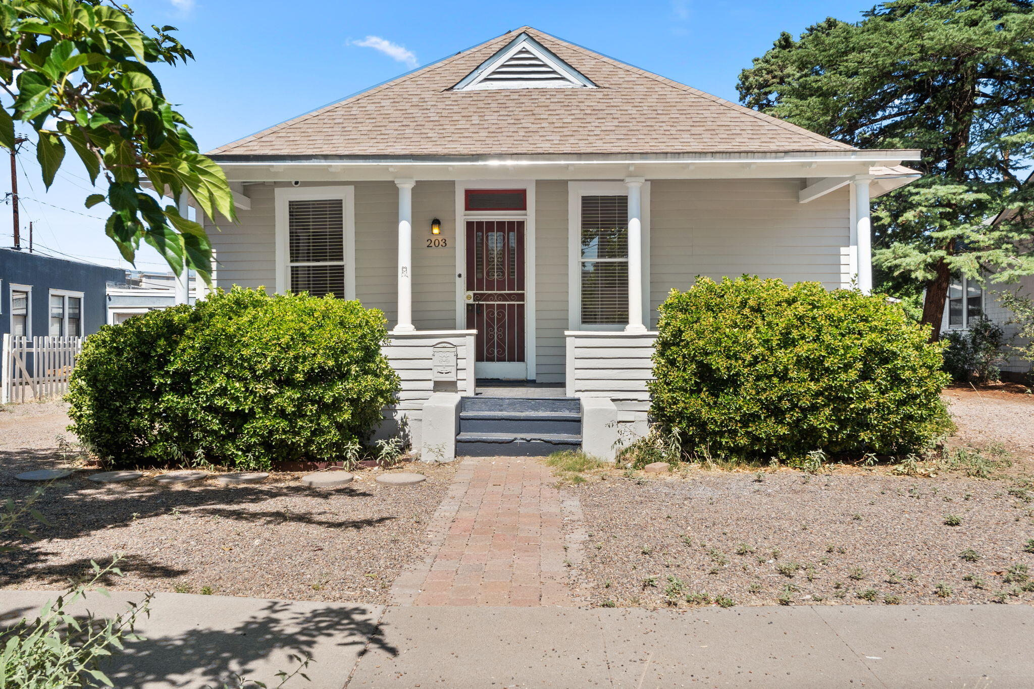 Wow! Completely updated and renovated  Craftsman Home built in 1916. Situated  on an oversized lot with workshop/storage. This home is located Downtown Neighborhood. Quick access to ART and easy walk to the Downtown Grower's Market. Carriage house in back is completely rebuilt. Beautiful, open floor plan.  Photovoltaic Solar for energy efficient living. This is a MUST see!