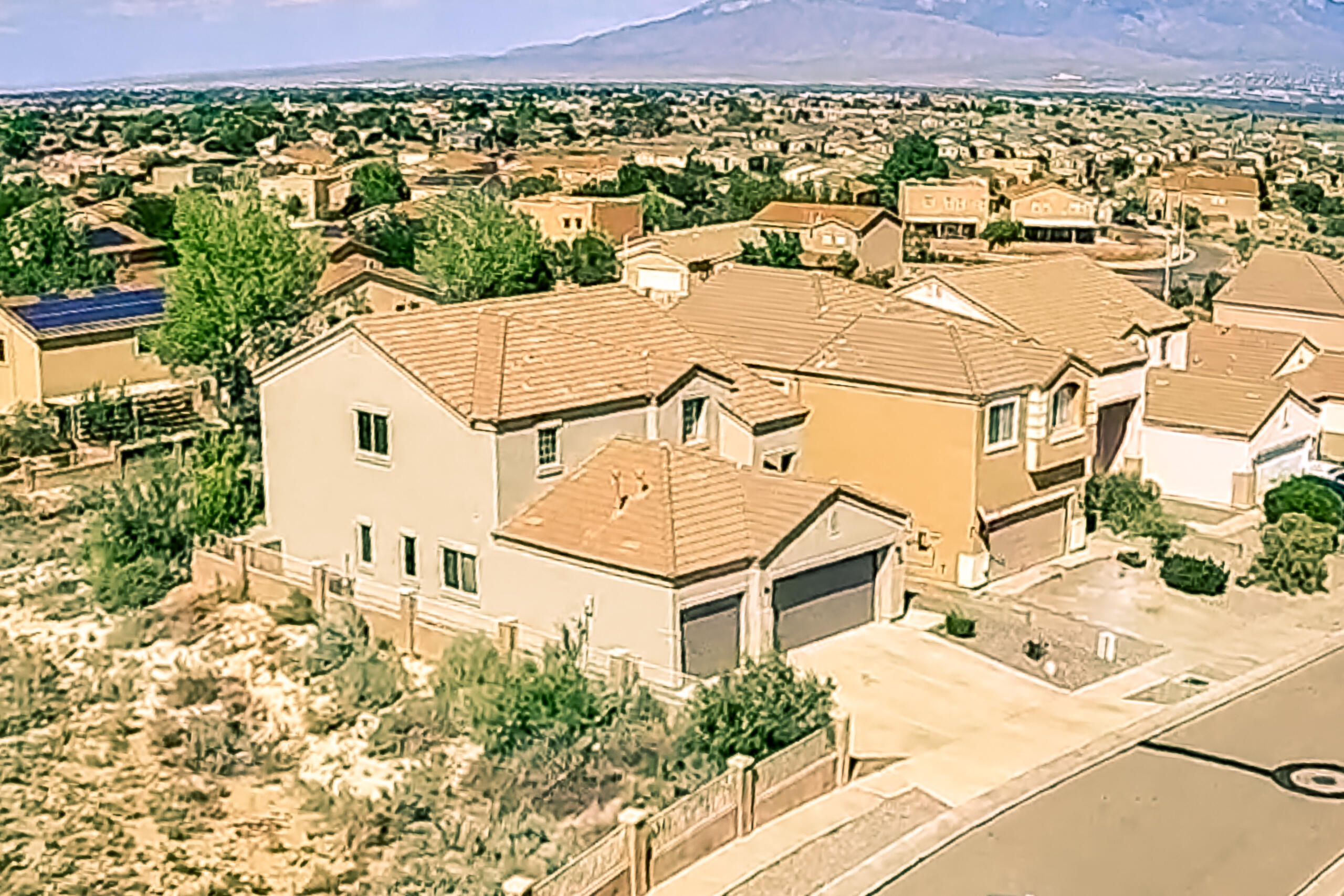 3.5% VA Assumable Loan. Spacious two-story home with four bedrooms, three-car garage, and refrigerated air conditioning. Located next to designated open space with no neighbors to the west and no immediate neighbors behind the home. North-facing backyard features lawn, concrete paver patio extension, fire pit, and panoramic mountain views. A walking trail runs directly behind the property. Roof has been recently serviced; stucco refresh in 2021. Interior includes new carpet, 9-foot ceilings on the main floor, ceiling fans throughout, and custom interior paint. Kitchen features a island with breakfast bar, granite countertops, stainless steel appliances including a gas range less than two years old, recessed stainless steel sink, brushed nickel faucet, custom backsplash,