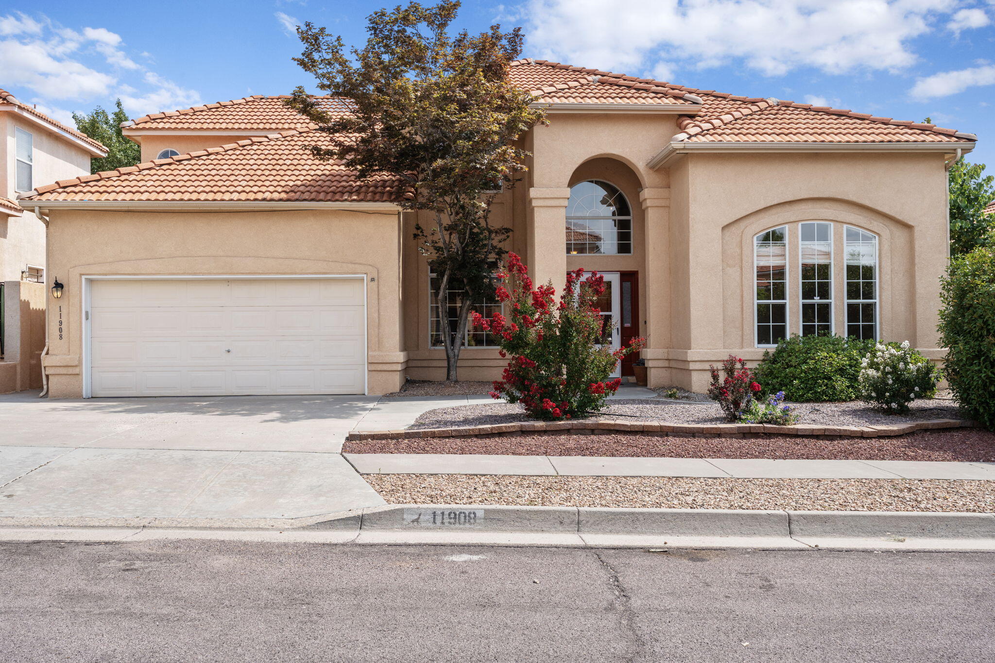 Welcome to Antelope Run in the far north east area of Albuquerque and the desired LaCueva school district, located on a cul de sac. Home offers 3 spacious bedrooms w/the option of a 4th bedroom & 3 bathrooms. Upstairs an added flex space, game room/hobby room. Expansive Primary suite on main level, walk-in closet, separate garden tub and shower, dual vanities. Two living spaces, formal dining room. Kitchen offers ample solid surface countertops and cabinets, all appliances convey. Functional living space. French doors lead to a covered patio, and well manicured yard. Back yard access. Near golf courses, restaurants, shopping.