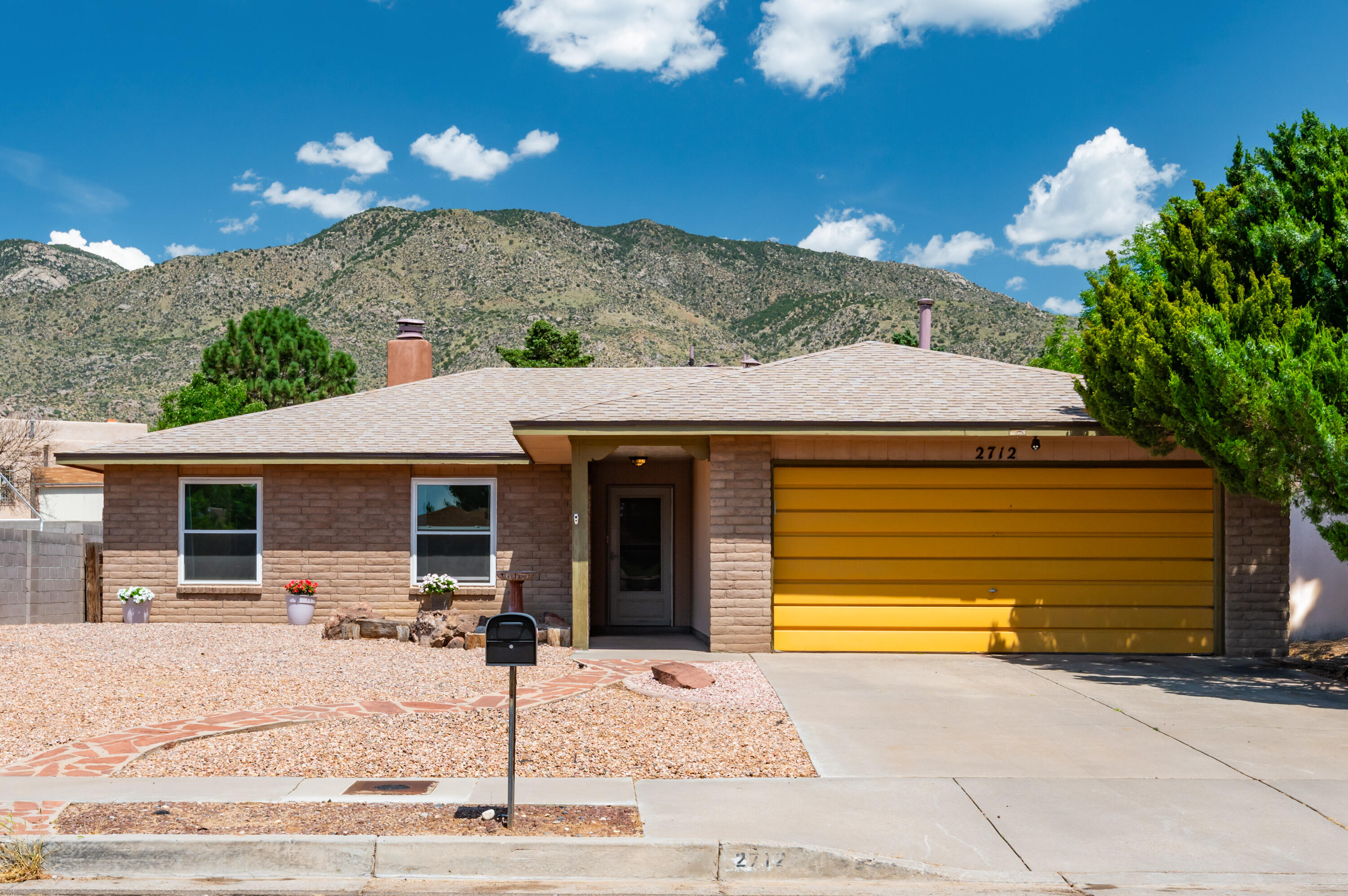 Great 3-bedroom, 2-bath home tucked away on a quiet cul-de-sac in Albuquerque's desirable Northeast Heights. This single-story home offers a thoughtful layout with formal living and dining areas, a cozy family room with fireplace insert, and an updated kitchen with newer countertops and cabinetry.Enjoy a spacious primary suite with dual walk-in closets, a private backyard, and a two-car garage. Located near top-rated schools, parks, and shopping... Lots of updates. 2019 New paint throughout -2019 New stucco - 2018 New Furnace -2017 New roof - 2016 New windows and patio door - 2015 New water heater - 2015 Master bath remodel - 2018 Guest bath update - 018 Kitchen update - 2018 New cook top, oven.. Seller open to a Flooring Allowance