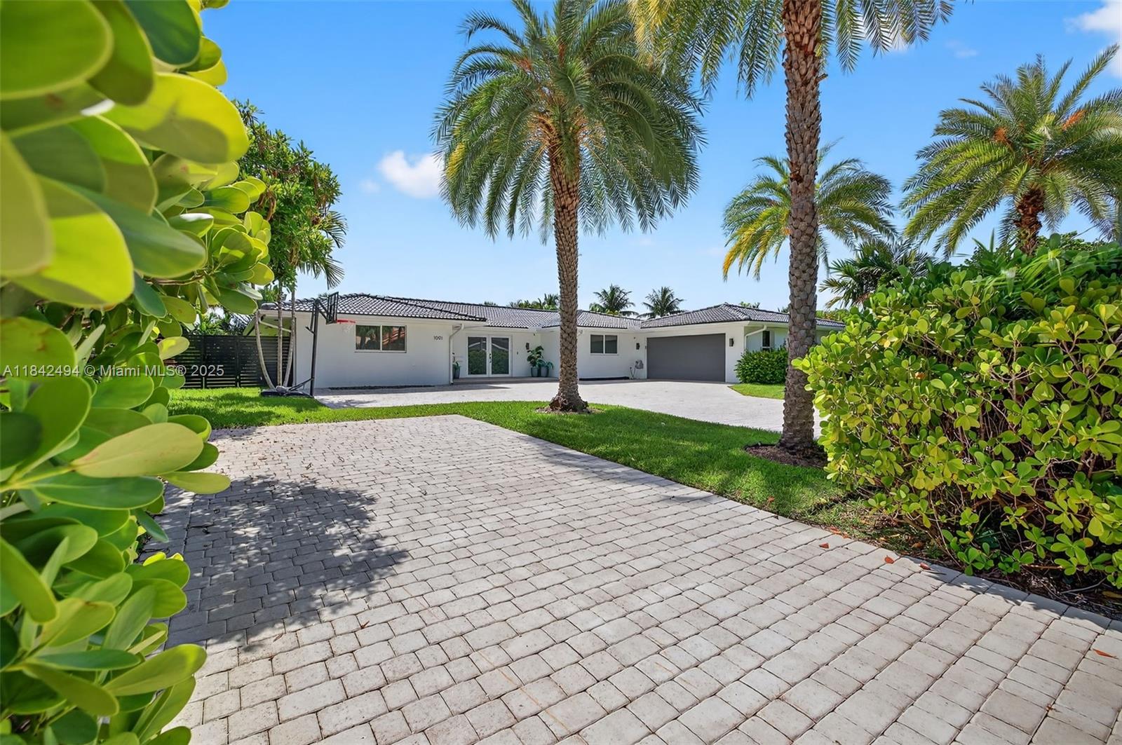 A 100% luxuriously renovated golf course home overlooking Shell Bay Golf and Country Club.  A chic, open concept living with a bright kitchen and a huge island with seating for 6, opens to a spacious living and dining area with cove lighting wrapping around the entire room. Elegant foyer with storage cabinetry w/ luxurious wood panels. A split floor plan of 5 bedrooms plus 4.5 bathrooms, custom closets throughout, finest quality interior doors with hidden hinges. Gentle glide, impact sliders open to a 600 SF covered entertaining terrace. Backing on to the exclusive, newly opened, Auberge Resort, Shell Bay Golf & Country Club. Move-in ready. Residence available fully furnished. Minutes to Aventura, Bal Harbor and FLL. Diplomat Parkway is southeast Broward's HAUTE' new area!