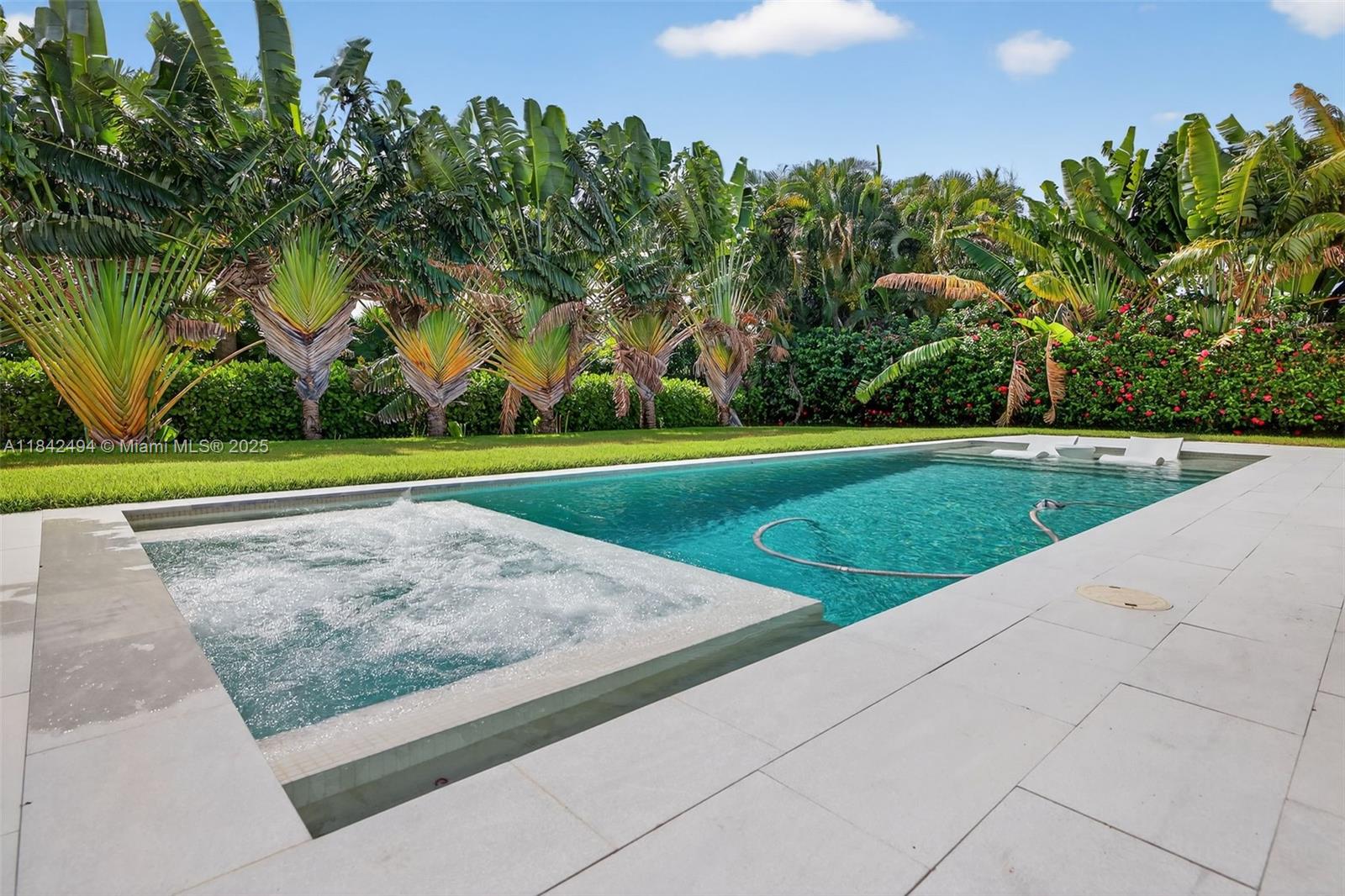 A 100% luxuriously renovated golf course home overlooking Shell Bay Golf and Country Club.  A chic, open concept living with a bright kitchen and a huge island with seating for 6, opens to a spacious living and dining area with cove lighting wrapping around the entire room. Elegant foyer with storage cabinetry w/ luxurious wood panels. A split floor plan of 5 bedrooms plus 4.5 bathrooms, custom closets throughout, finest quality interior doors with hidden hinges. Gentle glide, impact sliders open to a 600 SF covered entertaining terrace. Backing on to the exclusive, newly opened, Auberge Resort, Shell Bay Golf & Country Club. Move-in ready. Residence available fully furnished. Minutes to Aventura, Bal Harbor and FLL. Diplomat Parkway is southeast Broward's HAUTE' new area!