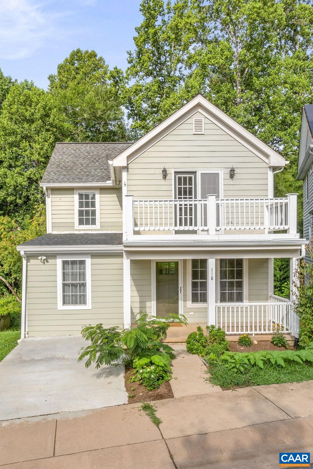 Tucked on a quiet cul-de-sac just minutes from Downtown, this home blends style, space, and a private location. Hardwood floors flow throughout both levels, including a bright office/4th bedroom addition. The kitchen features a water filtration system, opening to a dining area and a large deck overlooking peaceful woods. Upstairs: 3 bedrooms, 2 renovated baths, including a spa-like primary. Walk-out basement with full bath and rec room.  Unfinished area in basement offers ample storage.  Cul-de-sac’s green space makes it perfect for recreation!