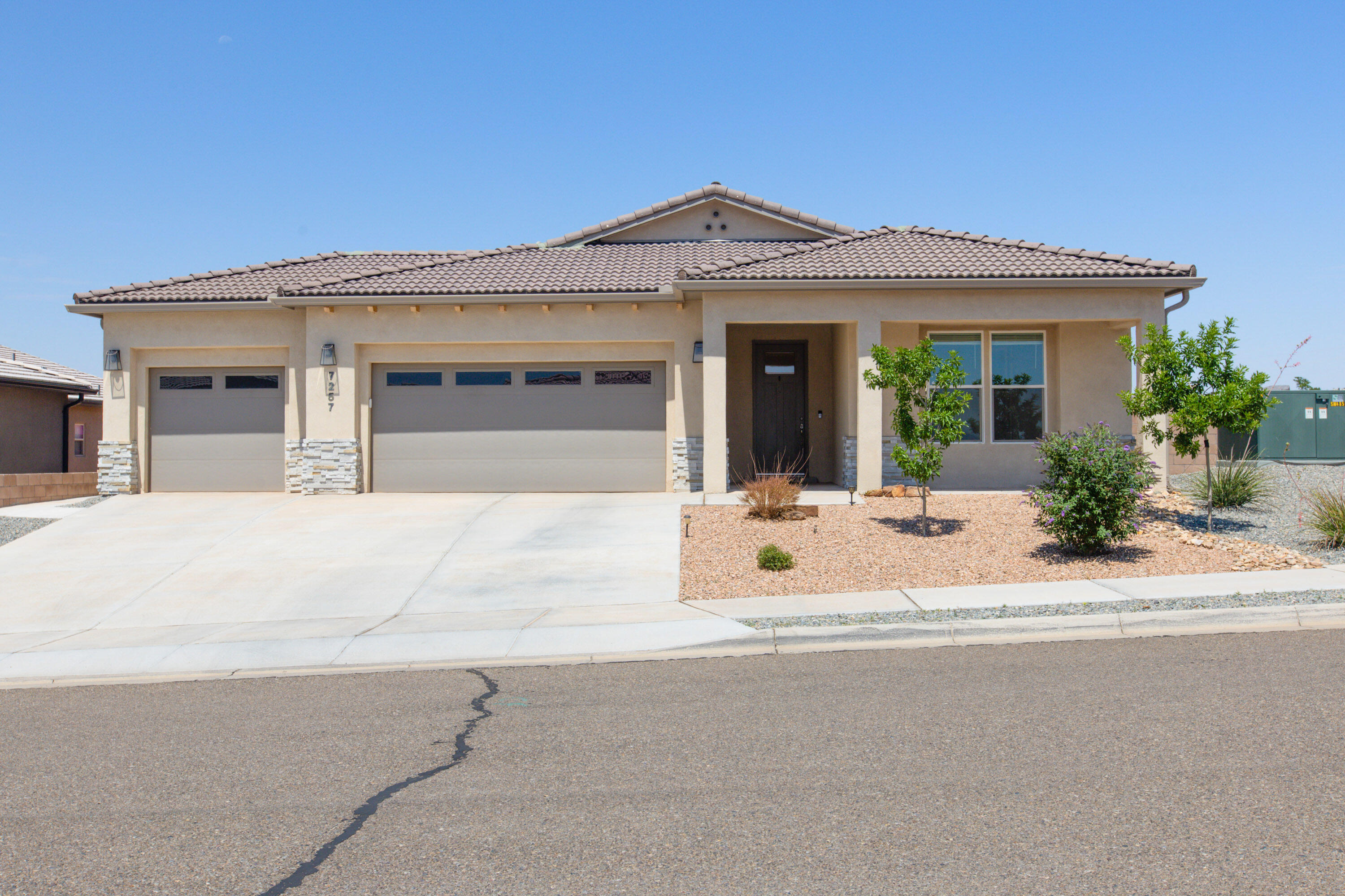 Fall in love  w/this STUNNING model like semi-custom, built by Ralyee homes! Located just a block from top rated elementary school! You will appreciate the open, bright & spacious floor plan w/4 bedrooms, separated master suite & 3 bathrooms! Inviting & expansive entryway leading to the gorgeous great room enhanced by raised ceiling w/5 luxury wood box beams, walls of windows flooding the home w/natural light & beautiful built-in cabinets flank the gas log fireplace w/stone accent surround. The DELUXE kitchen is equipped w/quality stainless steel appliances, gas stove, quartz counter tops, tile backsplash, white maple cabinets & bar seating opened to the great room! Stunning upgraded tile floors grace most of home. Separated master bath offers oversized tiled shower, large walk-in! MORE..
