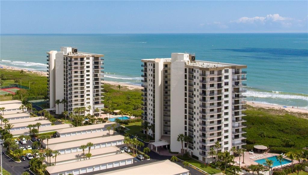 Great Oceanfront Corner Unit - totally redone, updated bathrooms & kitchen, 10 foot ceilings with crown molding, A/C and Hot Water tank replaced  in August 2021.   It's like owning your very own private beach house, just step out your back door to the beach walk, sand & ocean are right there waiting for you. Come see it today! Owner is a Licensed Real Estate Broker.