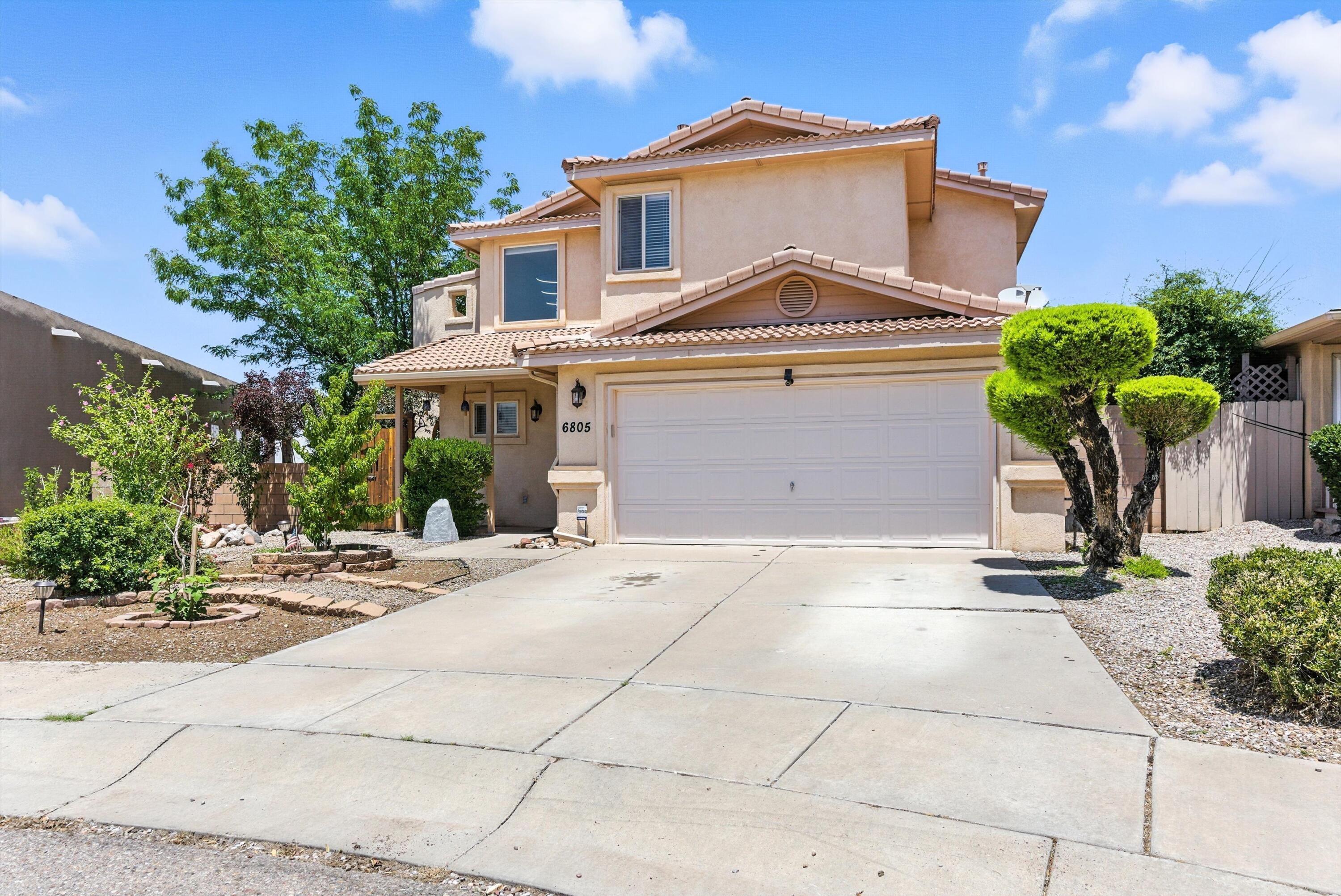 Stunning 3 bedroom, 2.5 bath home in Albuquerque's highly desirable Vista Del Norte community! This move in ready two story offers thoughtful updates throughout, including granite countertops, new luxury vinyl plank flooring, modern lighting, and stainless steel appliances. Enjoy open concept living and dining spaces, perfect for entertaining. The spacious primary suite includes a large vanity, walk-in closet, and abundant natural light. Outside, unwind under the custom pergola in your private, xeriscaped backyard with no rear neighbors. Additional highlights include a two car garage, low maintenance landscaping, and easy access to I-25, top rated schools, North Domingo Baca Park, Balloon Fiesta Park, shopping and so much more!