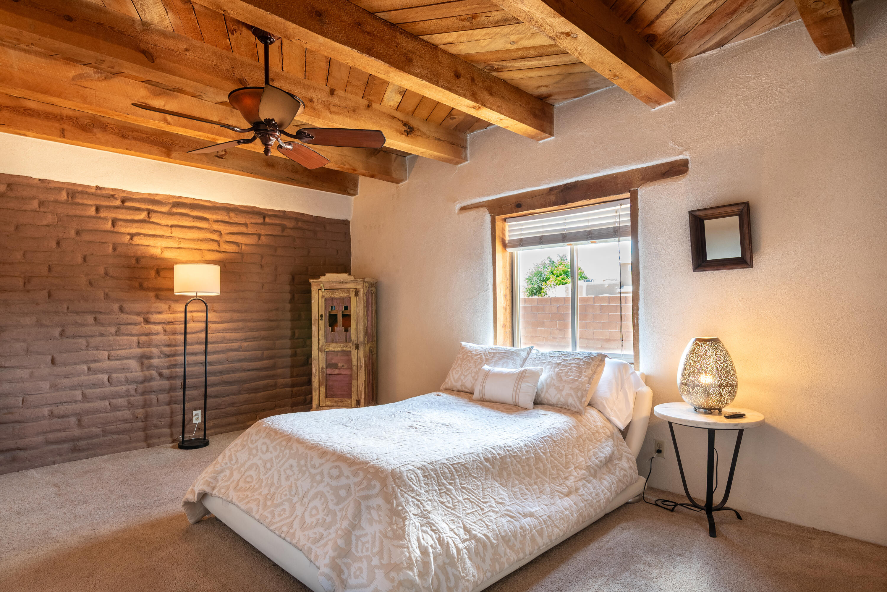 Precious Rambling Adobe in ABQ's Treasured North Valley Area of Rio Grande & Griegos Blvd.  Near Flying Star Bakery, El Patio, the Bosque Trails and More!  New roof, heaters & cooler!  Refreshed stucco and sewer line!!  4627 San Isidro NW Boasts its Original Vintage Charm with Comfortable, Updated Spaces.  Viga and Latilla Ceilings, Thermal Windows,  1400+ SQFT, 2 Bedrooms, 2 Bathrooms, Big Kitchen, Cornered Wood Stove, Cool Window Views and Fantastic Light!  We Love The Location, Condition and Price Here!  Note:  Driveway Contains an Easement Running E&W on N. Side to back lot.  Cute, Cute, Don't miss!!!