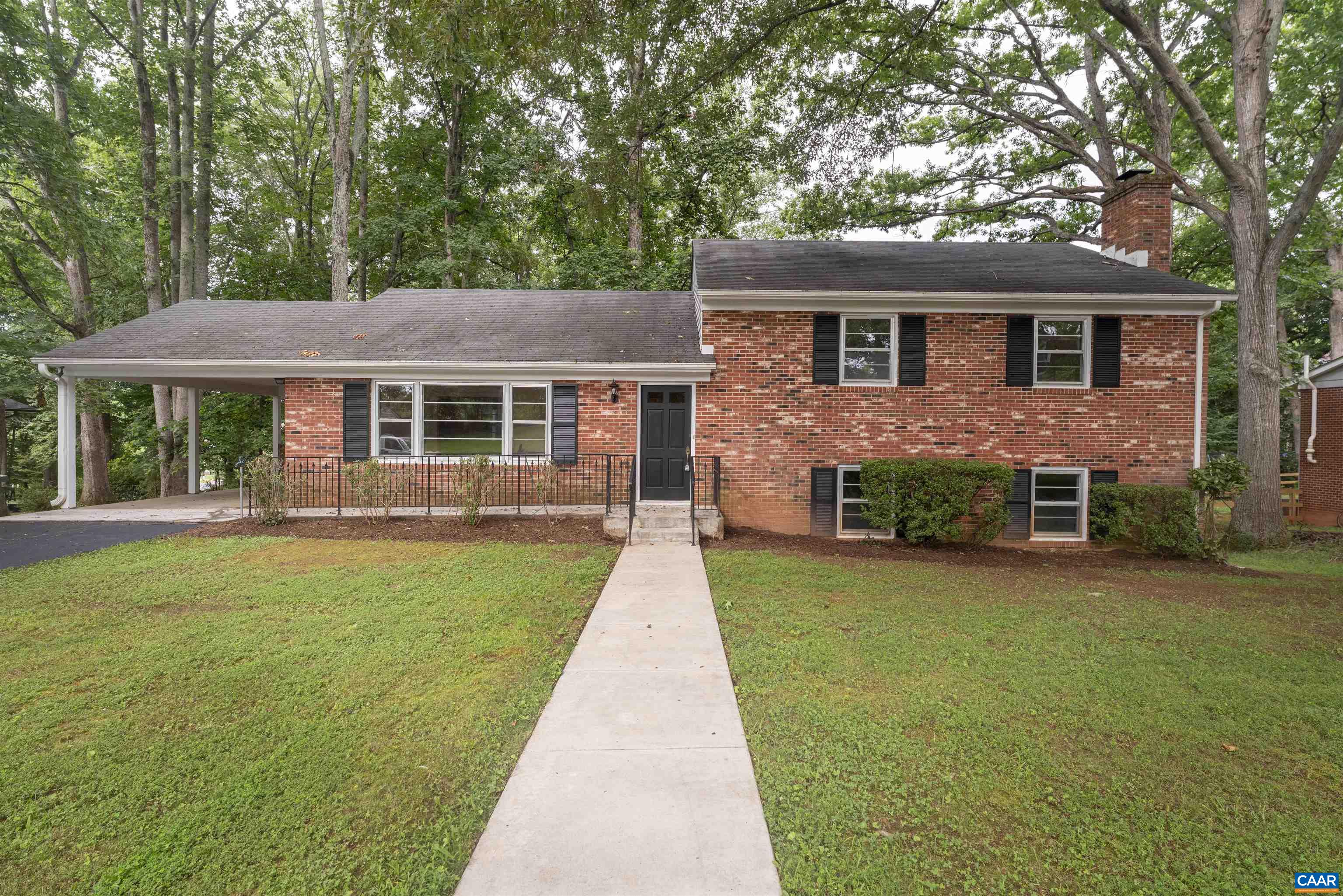 COMPLETELY updated and newly painted , new appliances, new air conditioning, wood floors redone , new carpet, on and on. Very solid, well built, brick home just renovated conveniently located to both Downtown or 29 North between Rio Road and Carrsbrook neighborhood. 4 Bedrooms, 3 full Baths , remodeled Kitchen with new counters and all brand new appliances, Living Room, Dining Room, bathrooms upgraded,   pleasant screen porch ,Rec room with fireplace , big walk out workroom basement  and carport. All on a quiet side street and sitting on a .43 acre lot. MOVE IN ready. Go any time. Wont last long. This is an established neighborhood with large trees and generous yards.