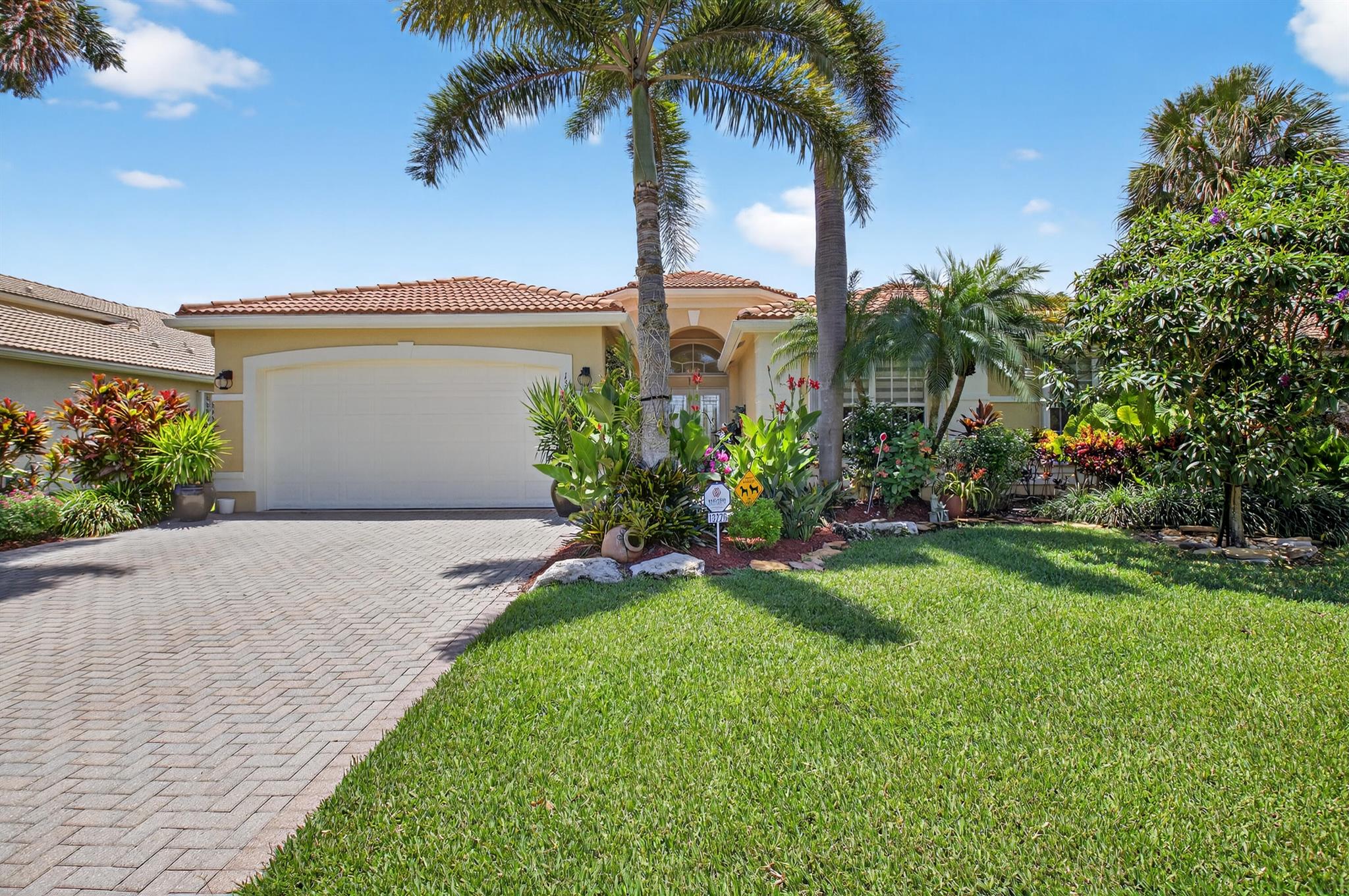 STUNNING  LAKEFRONT MADRID III MODEL, 4 BEDROOMS, 2 1/2 BATHS  UPGRADED HOME WITH A NEW EXPANDED PATIO WITH SCREENED LANAI COMPLETED 8/25,   EXTENDED GARAGE.  CUSTOM TOUCHES IN EVERY ROOM.NEWLY PAINTED  INTERIOR.  UPGRADED KITCHEN APPLIANCES AND NEW FINISHES ON CABINETRY. THIS HOME  PRESENTS LIKE A MODEL  AND IS MOVE-IN READY.  LEADED GLASS IMPACT DOOR, WELCOMING GRAND ENTRANCE LEADS  TO SECURED  GATED  OVER 55 COMMUNITY WITH RESORT STYLE LIVING ALL INCLUDED IN YOUR MAINTENANCE FEE OF 2545 PER QUARTER.  RELAX AND ENJOY THE BALLROOM, CARD ROOMS, SHOWS, CLUBS, CAFE,  POOLS, 6 HAR TRU TENNIS COURTS, AND PICKLEBALL.  MAINTENANCE $2545 PER Q, INCLUDES EXTERIOR HOME PAINTING, LAWN CARE, CABLE, INTERNET, HOUSE PHONE, EXTERIOR PEST CONTROL, POWER WASHING OF ROOFS, 24 HOUR SECURITY AT ENTRANCE.