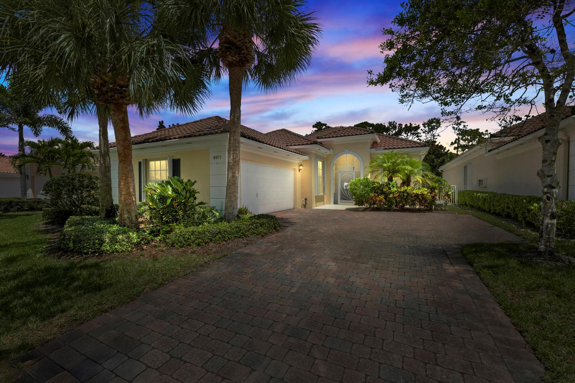 Welcome to Carleton Oaks - a private, gated Mediterranean&#8209;style community offering the resort-style living experience with a clubhouse, community pool, lighted tennis and pickleball courts, playground, well-maintained walking trails surrounding the serene 12-acre lake. This original-pristine canvas features accordion shutters throughout, whole house generator for peace of mind, a separate sunroom with impact windows, fresh exterior paint, 2021 water heater, and NO polybutylene plumbing.  The spacious CBS home offers 3 bedrooms with primary  bedroom tuck away for privacy, and two original baths providing ample space to create your sanctuary.  8971 Oldham Way offers high vaulted 10&#8209;ft plus ceilings, a den, 2 car air conditioned garage, fenced backyard with a view of lush preserve room for a pool. Ideal located just Northlake Blvd, with easy access to top beaches, golf, dining, shopping and major highways. Minutes to Hog Hammock Trail, Oaks Park, dog friendly Lilac Park, Lake Catherine Park &amp; Sports Complex, and more! The HOA covers landscaping, irrigation, security, cable, and common-area upkeep.