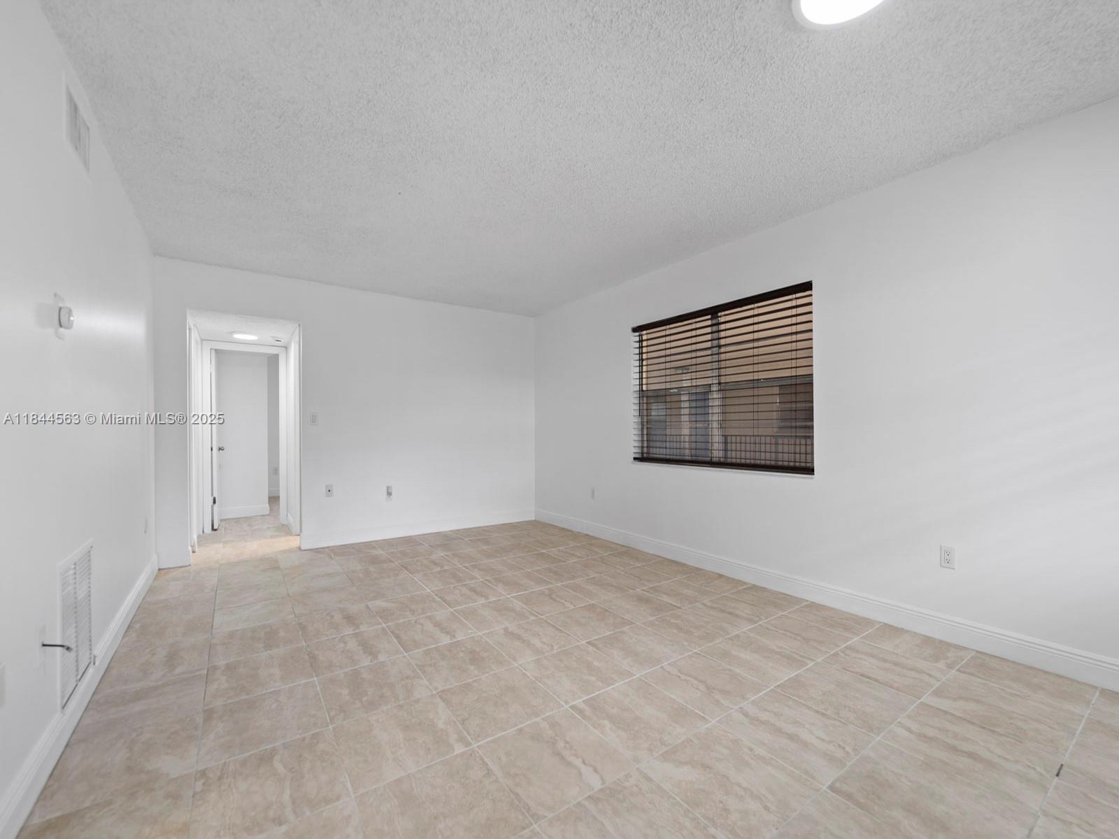 Don't miss this incredible Palmetto Bay area gem. 2 beds & 2 full baths in Coral Reef Townhome condo with 980 sq ft of bright, cheerful living space featuring a spacious living dining room, lovely updated chef’s kitchen. Modern upgrades throughout! All tile floors, great appliances, walk-in closets, and a fantastic balcony patio. A top value and lifestyle opportunity in Palmetto Bay! Spotless and move-in ready. Amenities include pool, reserved parking, beautiful common areas, generous guest parking. Perfectly located in the heart of the Palmetto Bay and the Falls area.  All top-rated schools!