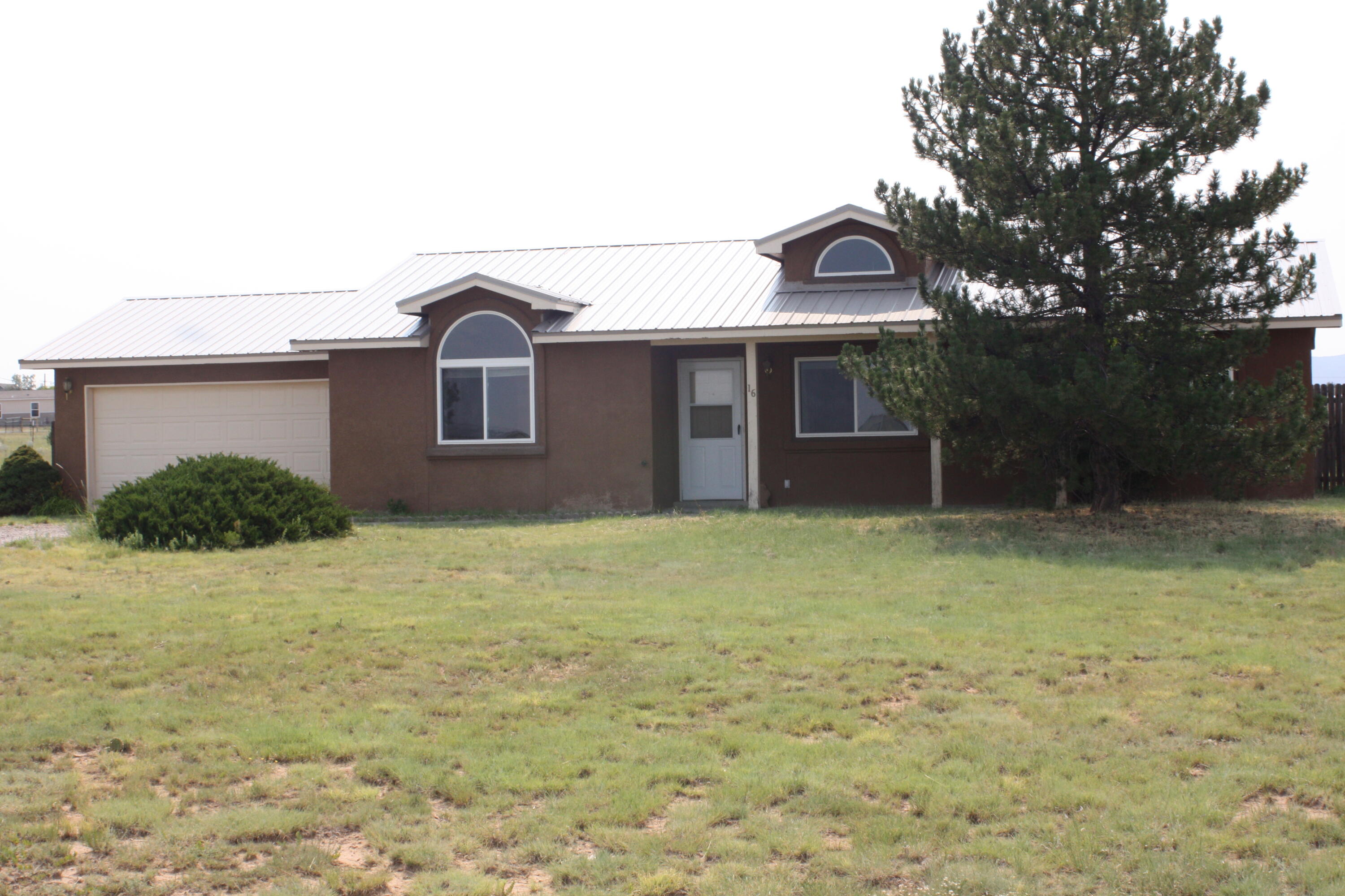 Charming 3-Bedroom, 2-Bath Home on Approximately One Acre!  Welcome to this inviting home nestled on approximately one acre in Northeast Edgewood. Enjoy the perfect blend of peaceful country living with the convenience of nearby town amenities just minutes away.  This delightful property features a cozy 3-bedroom, 2-bath layout, ideal for comfortable living. Start your mornings with sunrise views from the east-facing picture window in the living room, and unwind in the evenings on the porch in the fenced back yard, while taking in stunning sunsets.  With ample outdoor space, there's plenty of room to garden, entertain, or even bring your horses--this property welcomes them!   Don't miss this opportunity to own a slice of tranquility.
