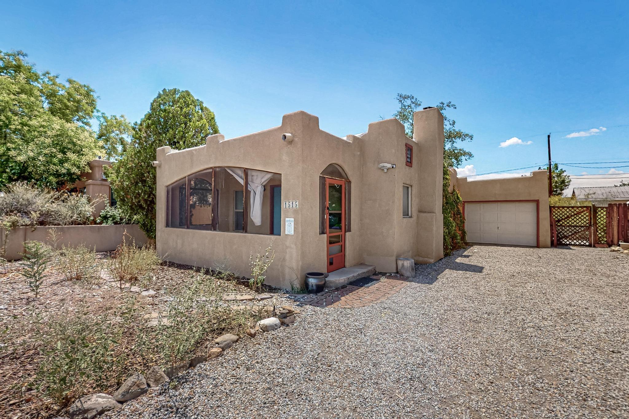 Welcome to this inviting 3-bedroom, 2-bath home in the desirable Sawmill/Wells Park neighborhood! A delightful 120 sq. ft. covered and screened-in front porch offers a warm welcome and the perfect spot to relax. Home is designed so the rear portion can be separate from the main home. Perfect for Airbnb, rental or in-law quarters.Step inside to a cozy living room with gleaming real hardwood floors and a custom wood-burning stove. The front bedroom is ideal as a home office or study. The charming country kitchen features a breakfast nook, and plenty of natural light.