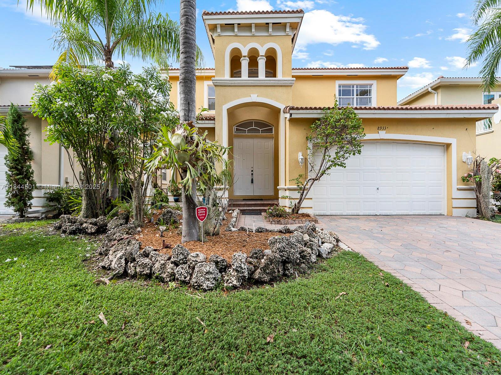 Rarely available and priced to sell unit in Cantamar! Nestled on the tree-lined streets of this charming Cutler Bay community, this 3-bed, 2.5-bath Cutler Bay gem offers an expansive, light-filled layout with soaring 20-ft ceilings in formal living, plus family room, dining room, and breakfast nook. Well distributed kitchen with peninsula opening towards living area. Upstairs features wood floors, a flexible loft (ideal 4th bedroom), and spacious bedrooms with ample closets. Enjoy a serene backyard with covered terrace, lush landscaping, and mature trees. Freshly painted and a two car garage to boot. Perfectly located near new Legacy Park, top schools, shopping, dining, and Old Cutler Rd. Low HOA and No CDD. Easy to show!!!