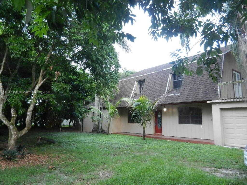 REDUCED AND READY TO RENT! THIS LARGE TWO STORY FIVE-BEDROOM 3.5 BATH HOME WITH A ONE CAR GARAGE OFFERS TWIN MASTER BEDROOMS AND TWO LIVING ROOMS MAKING FOR SOME VERY COMFORTABLE MULTI-GENERATIONAL LIVING SPACE. A MAGNIFICENT BALCONY AMONGST THE TREE TOPS AND LOVELY BACK PORCH, FRAMED BY TASTEFUL FOLIAGE AND FRUIT TREES, ARE PERFECT FOR STARGAZING AND ENTERTAINING RESPECTIVELY. PLENTY OF SPACE FOR BOATS, RVS, DOGS, ETC. COME FEEL THE PEACE AND TRANQUILITY OF THIS COUNTRY HOME SET AMOUNG A GROVE OF PROFESSIONALLY MAINTAINED LYCHEE TREES.  SHOWINGS ARE ONLY AVAILABLE TO ESCORTED PRE-QUALIFIED TENANTS WITH PROOF OF INCOME.  NO HOA AND LANDLORD FLEXABLE WITH PETS. TEXT MICHAEL FOR MORE PHOTOS, VIDEO FOOTAGE, AND GREATER DETAILS.
