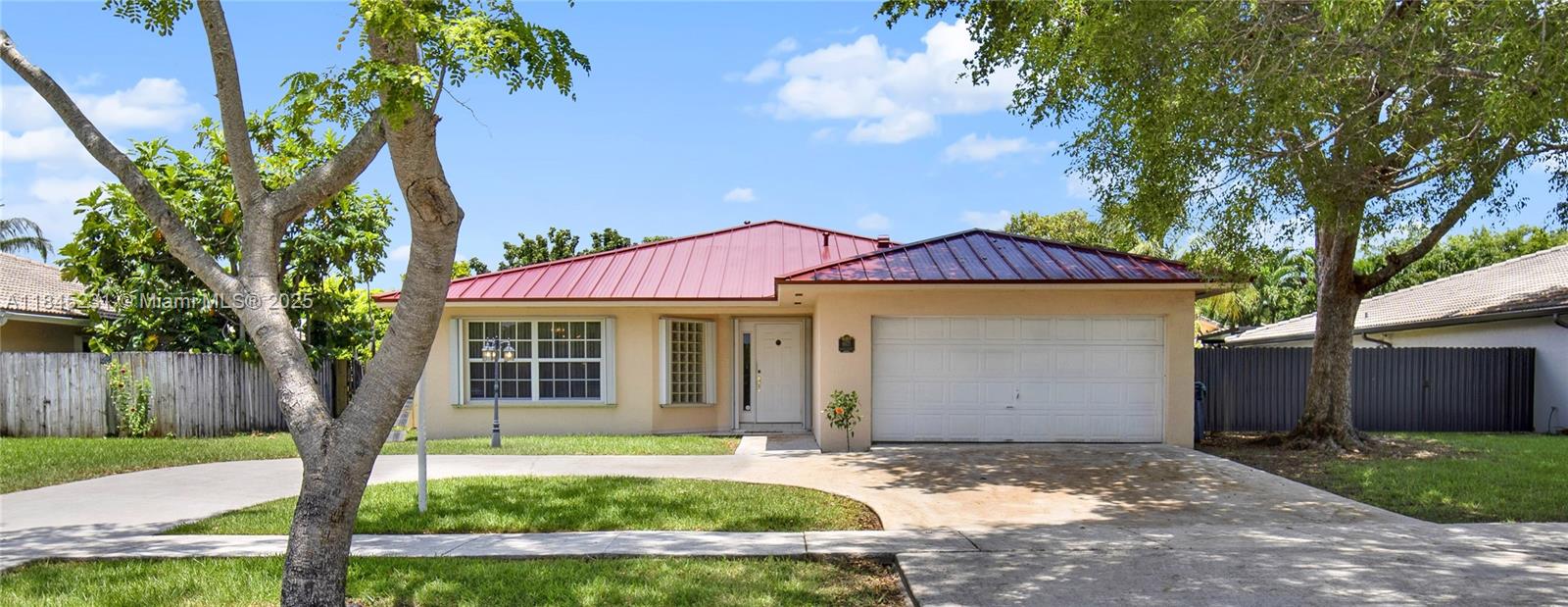 HUGE PRICE IMPROVEMENT!  This 4 bedroom, 2 bath Cutler Bay home offers effortless curb appeal with a circular driveway and a bright, inviting layout that feels like home the moment you walk in. Inside, wide open living spaces connect seamlessly to a stylish kitchen - perfect for hosting, relaxing, or both. A brand new "standing seam" metal roof tops it all off with sleek durability and long term value. What really sets this home apart is that it overlooks Historic Old Cutler Road, with a beautiful 3 acre park/green space right in front blending natural beauty with Florida charm. Room to park boat/RV. No HOA...call today! Roof warranty transfers to new owner.