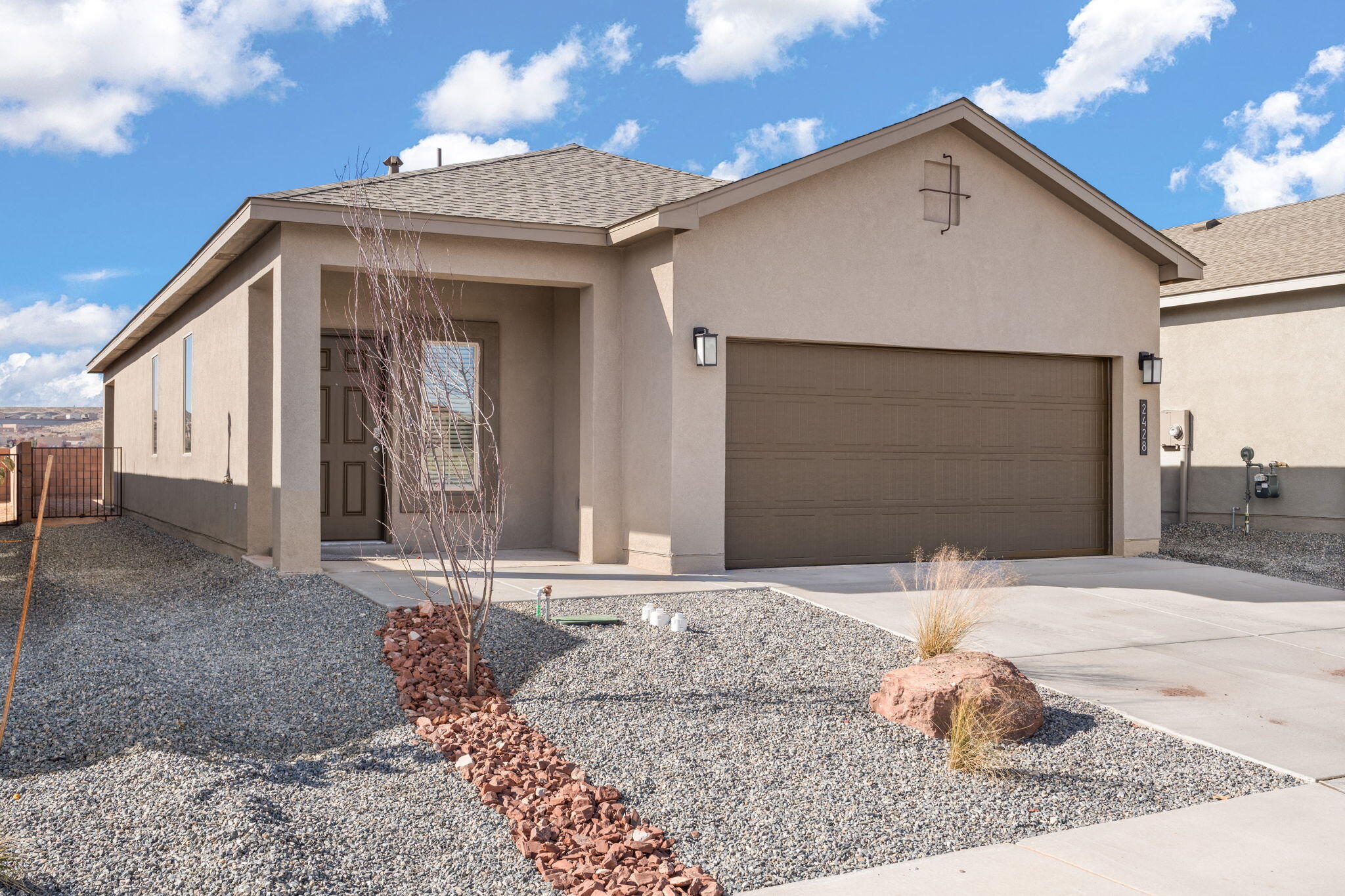 Welcome to this elegantly designed 1,420 sq ft home by D.R. Horton, which perfectly blends style, comfort, and modern amenities. This home features a thoughtfully designed floor plan with separate living and dining areas, making it ideal for both relaxation and entertaining. The kitchen stands out with its stylish pendant lighting, while the open-concept layout ensures a smooth transition between spaces. Enjoy the convenience of a spacious walk-in closet in the primary bedroom, providing ample storage. The generously sized bedrooms offer comfort and privacy for the entire family. The smart home package adds an extra layer of convenience, allowing you to control essential features remotely.