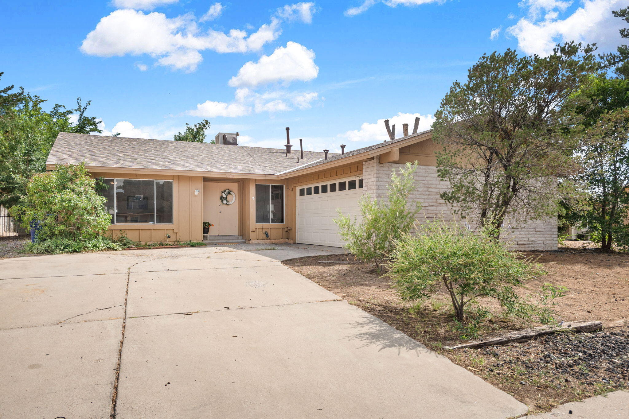 Welcome to this spacious home in Academy Acres West, offering approximately 1,750 sqft of living space! Inside, you'll find 3 bedrooms, an office that can serve as a 4th bedroom, 2 bathrooms, and two living areas that provide flexibility for work, play, or relaxation. The generous floor plan includes a cozy fireplace and a two-car garage. The home has a new roof (2025) and is move-in ready with opportunity to update and personalize to your style. The yard is a great size, providing room for outdoor fun, gardening, or entertaining. Located in the desirable Academy Acres West area, this home is close to shopping, dining and major roads for easy access around the city. Priced well for the size and location, this home is an excellent opportunity for a buyer looking for value and potential!