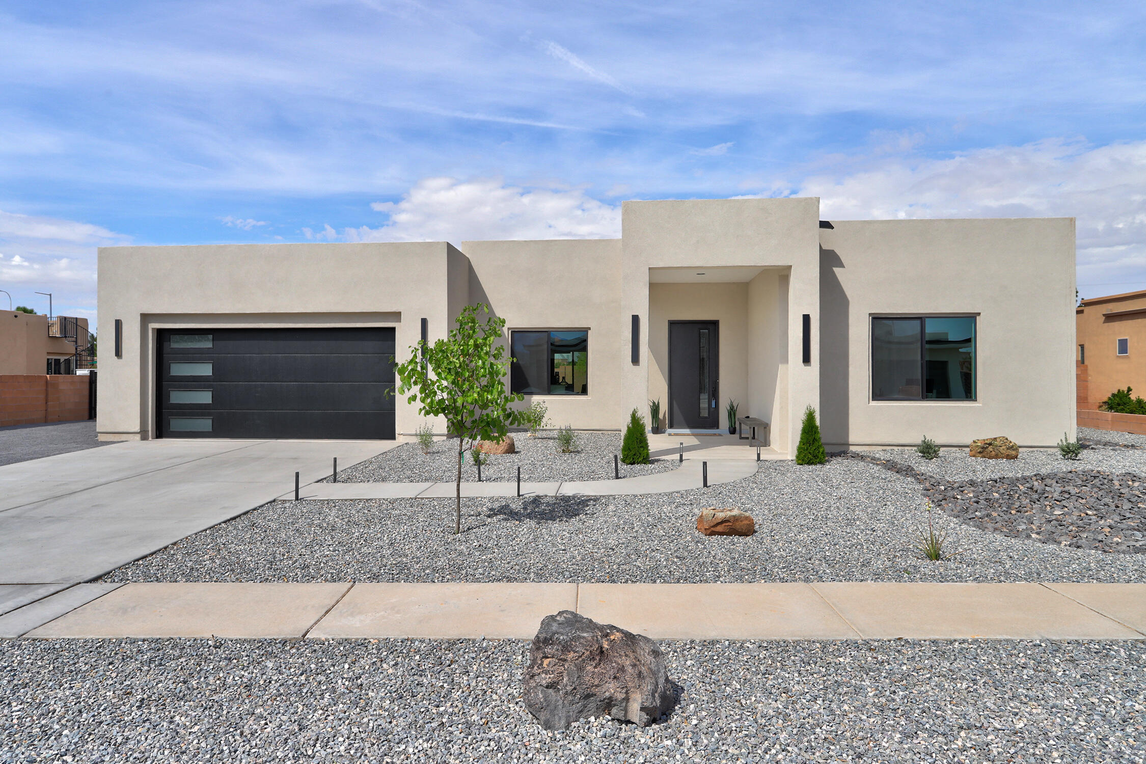 ***OPEN House Saturday & Sunday, July 26 & 27, 2025 from 1pm - 4pm.***Step into luxury with this newly-built, single-story dream home that perfectly blends contemporary elegance with desert charm. Featuring soaring ceilings, 5 spacious bedrooms (2 primary suites), 3 beautifully designed bathrooms, and an oversized/ finished 2-car garage including tall doors--perfect for parking your dream truck--this home is thoughtfully crafted for comfort, functionality, and style.