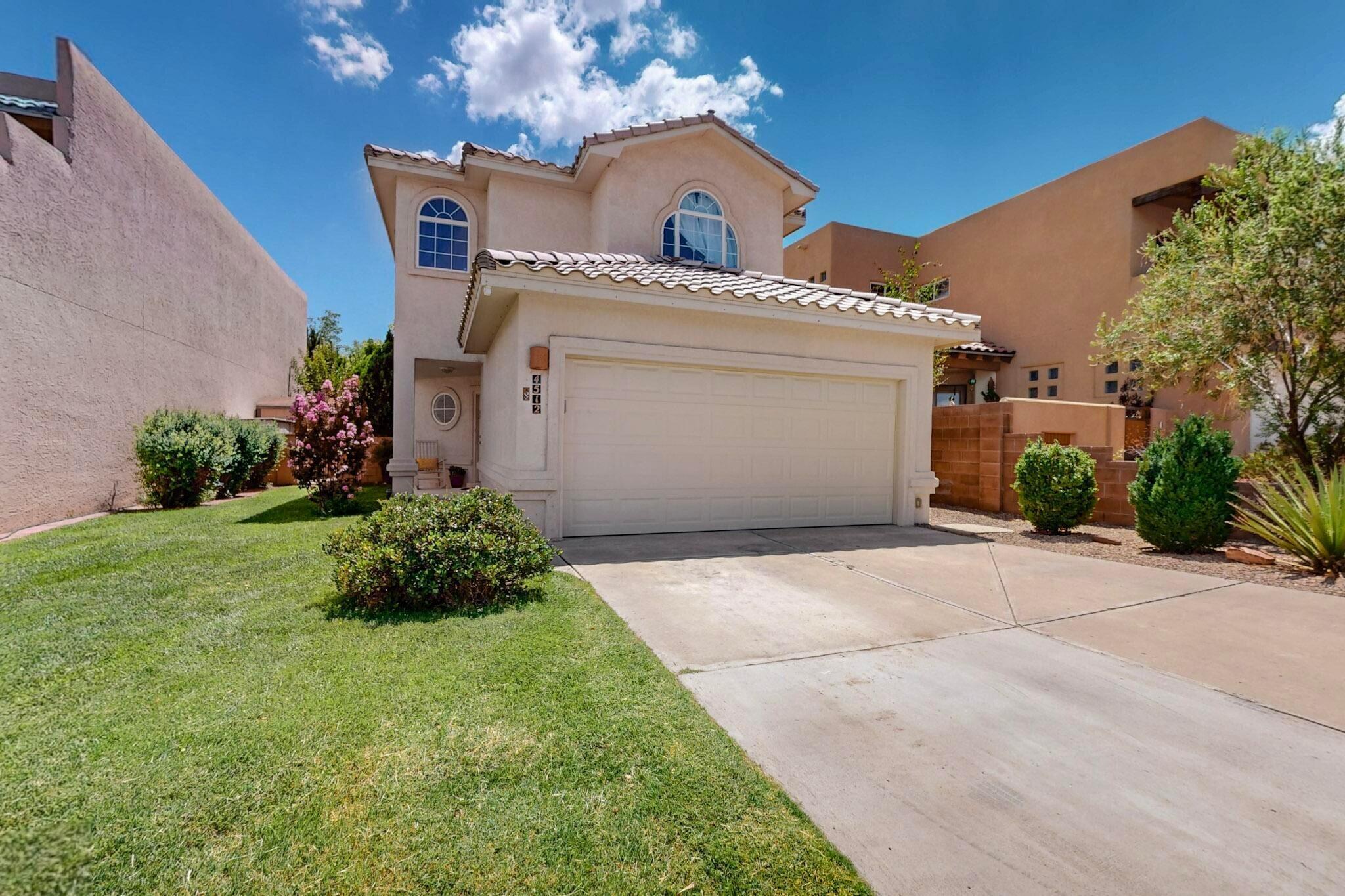 This home is nestled in an desirable location with beautiful city and mountain scenery. Features within the home include a spacious loft that overlooks the family room below. Master bedroom has a covered private balcony, large, updated garden tub surround and shower. All bedrooms are located on the second floor. The main floor is an open concept featuring the kitchen, dining room, living room and half bathroom. This home has space for entertaining both inside and out. The beautiful kitchen is updated with new tile flooring, granite countertops and stainless-steel appliances. Relax in the lush green, private backyard. There is quick access to major commuter roads, grocery stores, movie theater, restaurants and more. The beautiful Rio Grande, Bosque and National Park are close by.
