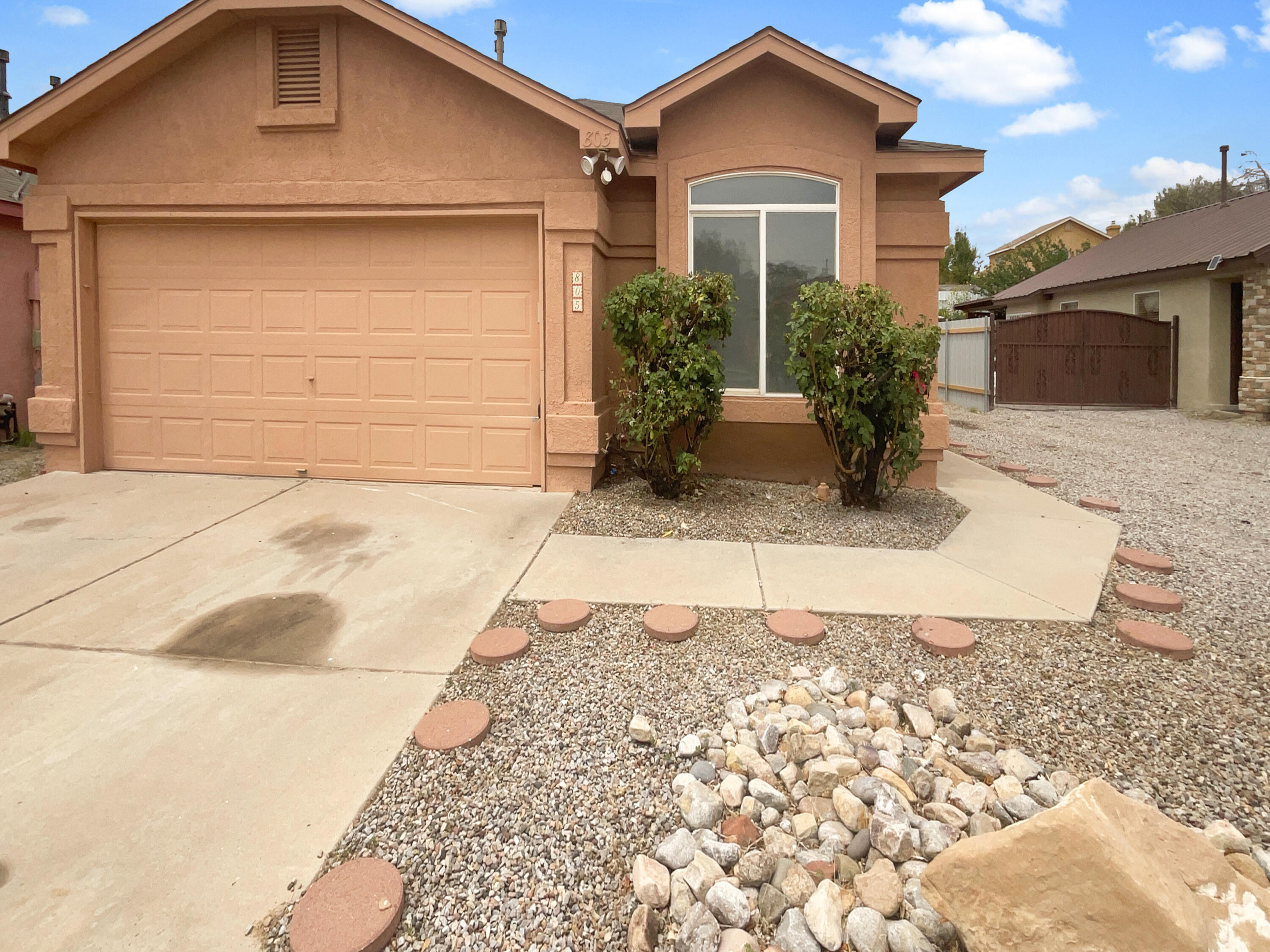 Welcome home! This home has Fresh Interior Paint, New flooring throughout the home and offers a large backyard. A fireplace and a soft neutral color palette create a solid blank canvas for the living area. Relax in your primary suite with a walk in closet included. The primary bathroom complete with double sinks and under sink storage. Take it easy in the fenced in back yard. The covered sitting area makes it great for BBQs! A must see! 100-Day Home Warranty coverage available at closing