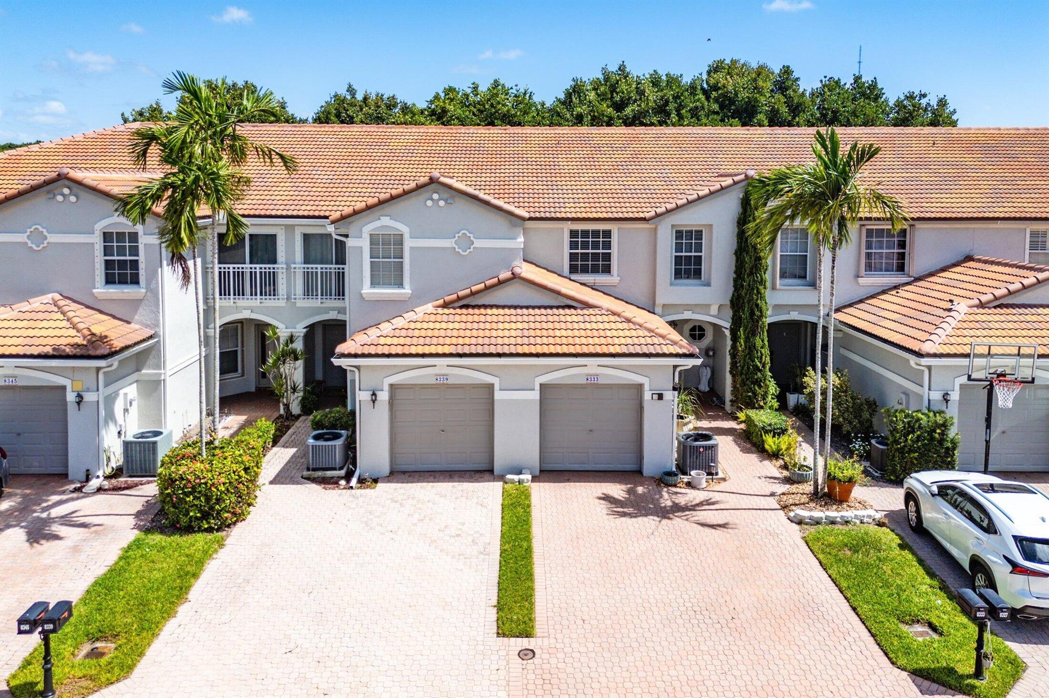 Stunning Casa Sol Model with fantastic updates & features. This 3 bedroom, 2.5 Bath townhome has All Impact Windows/Sliders (2017), Tankless Water Heater (2018) NEW ROOF (2022) Gutters (2023), 3/4'' Thick Glass Railings (2023), New A/C (2024), 1 Car Garage,  Water views from your front door & upstairs bedrooms - 1 of only a handful that had a premium lot like this. Eat-in kitchen, 9 ft ceilings, upgraded cabinets, Spacious Living & Dining & Powder & Screened enclosure complete the main floor. 3 Bedrooms upstairs - all with Custom Real California Closets, updated baths. Primary has vaulted ceilings. Full size laundry.  Low HOA covers 24/7 Manned Guard gate, Cable, Alarm, Clubhouse with Fitness, Pool, Tennis Playground.  A Rated Boca Schools - this has it all. Don't delay -rarely available!