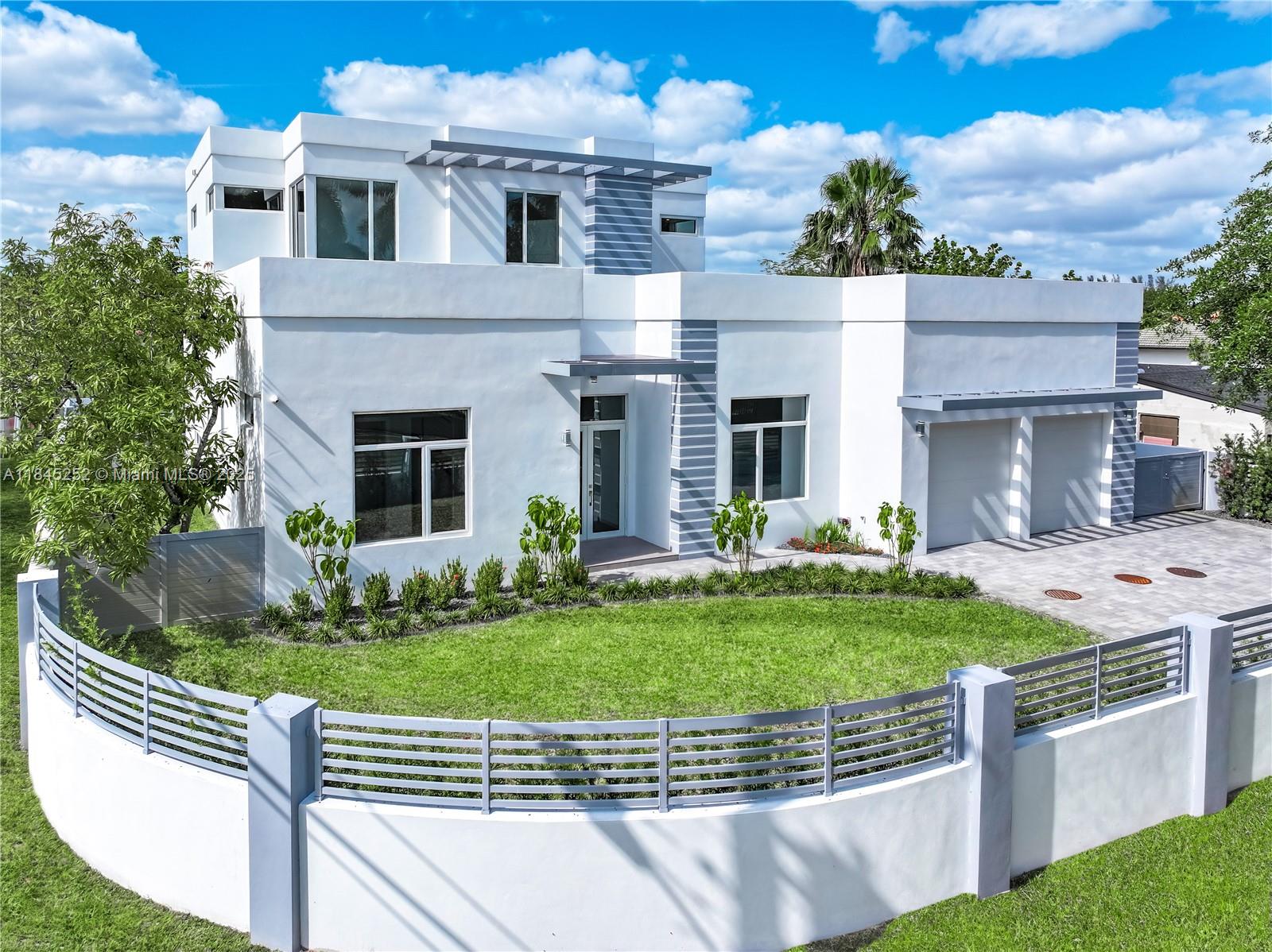 Experience luxury living in this NEW construction,modern 2-story home in Doral’s exclusive Vanderbilt Park— the city’s only no-HOA community. With 4,510 SF total (4,091 SF adj), this reinforced Concrete “BUNKER” residence is engineered to withstand most Hurricanes. Inside:5B/4.5Bath, 12-ft ceilings, impact windows/doors, flat concrete roof, open-concept layout, smart-home/elevator capabilities & luxury finishes. Gourmet kitchen offers pro-grade stainless appliances and a walk-in pantry. Master suite enjoys his-&-hers closets w/ direct pool views. Outside: Resort-style pool/spa with built-in grill, & concrete-built fence. Minutes to MIA, Brickell, top schools, parks, major expressways, Baptist/Jackson/UM Hospitals, & premier shopping malls: CityPlace Doral, Dolphin & International.