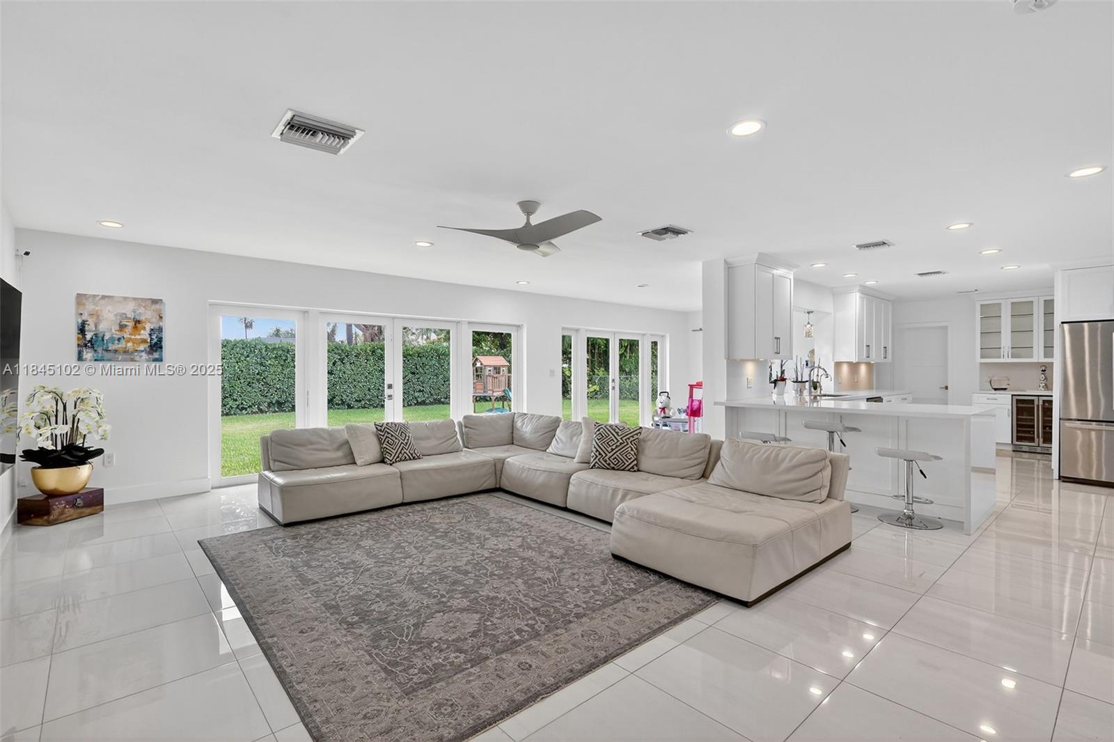 Reduced price!!! Now vacant, easy to show, and move-in ready just in time for the holidays. This beautifully updated 4BD/4BA home in prestigious North Palmetto Bay, steps from Pinecrest, sits on a spacious 18,100 sq ft corner lot in a quiet upscale neighborhood. Filled with natural light through impact doors and windows, it features a modern kitchen, formal dining room, and a large primary suite with a private sitting area. Two A/C units, two water heaters, and smart home technology provide comfort and convenience, all within minutes of top-rated schools, parks, shopping, and fine dining.