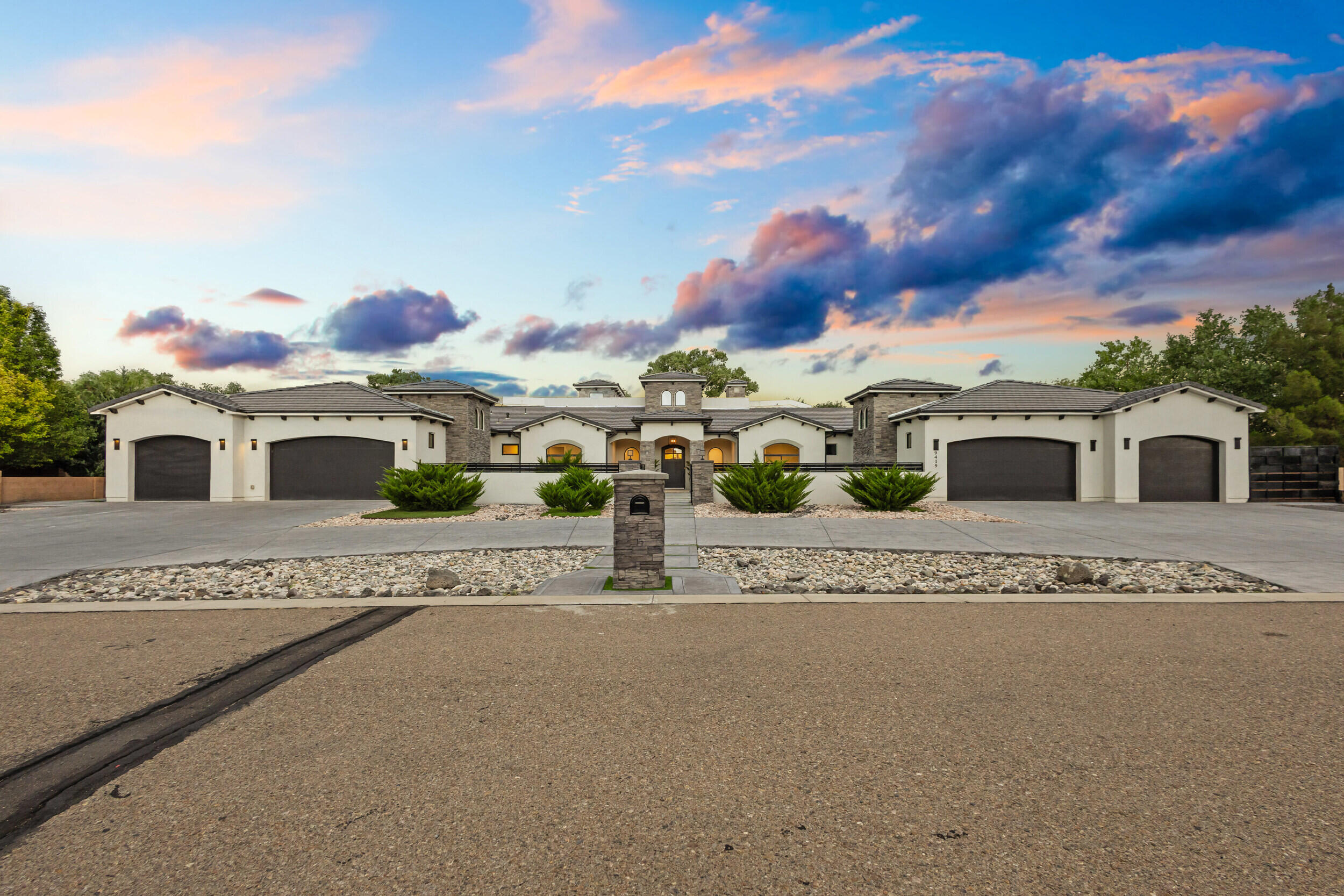 Stunning custom home in the sought-after Black Farm Estates with 4 bedrooms, an office, and a theater room. Soaring 14' coffered ceilings and a 21' entry tower create a grand first impression. The chef's kitchen features dual islands, 13 quartz slabs, commercial-grade appliances, JennAir fridge, and a butler's pantry with beverage fridge. Outdoor kitchen includes quartzite counters, teppanyaki grill, BBQ, and cooler. The approx. 800 sq ft primary suite boasts a spa-style shower and 2 hidden rooms. Enjoy a heated pool, hot tub, exterior fireplace, covered fire pit, garden, and chicken coops. 6-car garage. A rare opportunity--schedule your tour today!