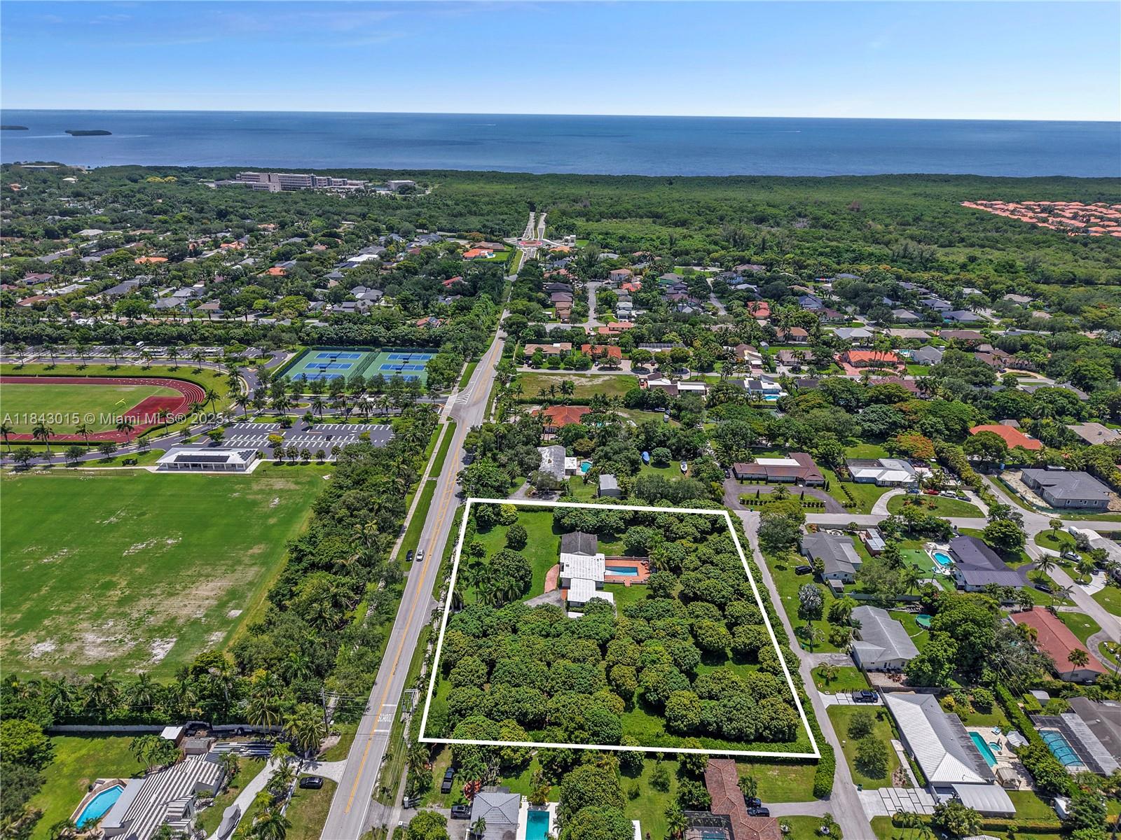 Development opportunity in Cutler Bay to build up to 6 homes next to Palmer Trinity Private School! This 2.28-acre property, just off scenic Old Cutler Rd, offers endless potential — build, develop, or enjoy as-is. Close to Black Point Marina, The Falls, Southland Mall, Deering Bay Estate, parks, and US-1 for easy access to Miami and the Keys. The lush lot, filled with mango trees, includes a 4-bed, 3-bath, 2,635 SF home ready for your vision. Has 2 entrances, one on SW 184 St and SW 184 Ln. Large parcels like this in such a prime location are hard to find.  Seller will consider Owner Financing/Seller Financing.