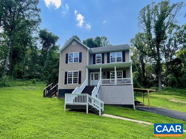 This beautifully updated home in Albemarle County is truly move-in ready! Set on 1.46 acres with partial mountain views, this 4-bedroom, 3.5-bath home has been completely renovated from top to bottom—offering the perfect blend of modern style and comfort. Step inside to find gleaming solid oak hardwood floors and a bright, open layout. The all-new kitchen features soft-close cabinetry, quartz countertops, a stainless steel farmhouse sink, and space for an eat-in dining area. Step right out to the side deck—perfect for grilling and summer nights! The living room room opens to a spacious back deck ideal for relaxing or entertaining, while the wide front porch welcomes you with charm and curb appeal. Enjoy the convenience of a paved driveway, and stay connected with Brightspeed fiber internet available. Every detail has been thoughtfully upgraded, giving this home a fresh, like-new feel throughout. Don’t miss this stunning Albemarle property—where peaceful views, modern updates, and a prime location come together in one perfect package! TRANE dual zone heat pump replaced in 2024! Gas range installed but electric is available if that's your preference. NEW roof, windows, fresh paint and hardwood floors recently refinished!