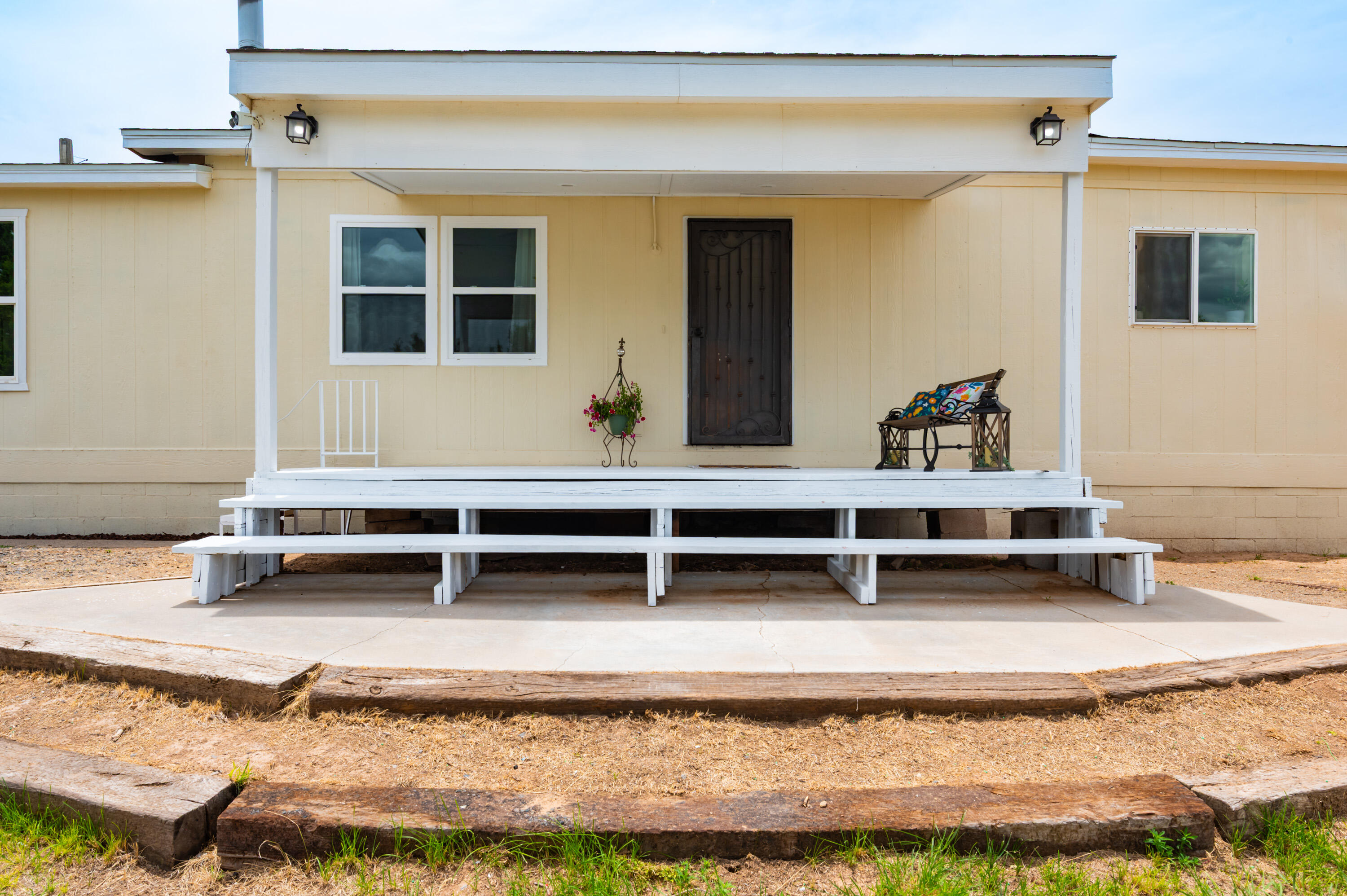 OPEN SAT 7/26 1-3 PM. 58 Mustang Rd is a beautifully remodeled, 4 bed, 2 bath, well-kept home right in the heart of Edgewood. The gourmet kitchen features a large island, updated appliances and a coffee bar to boot. There is also a large bonus living space/craft room/den. The outdoor spaces are fully fenced and cross fenced with a chicken coop area, garden space, and corral area. The detached garage is expansive and ready for your workshop and/or toys.  Property has fresh paint, some newer windows (2025) and lots to offer. Come see this adorable home today and make it yours!