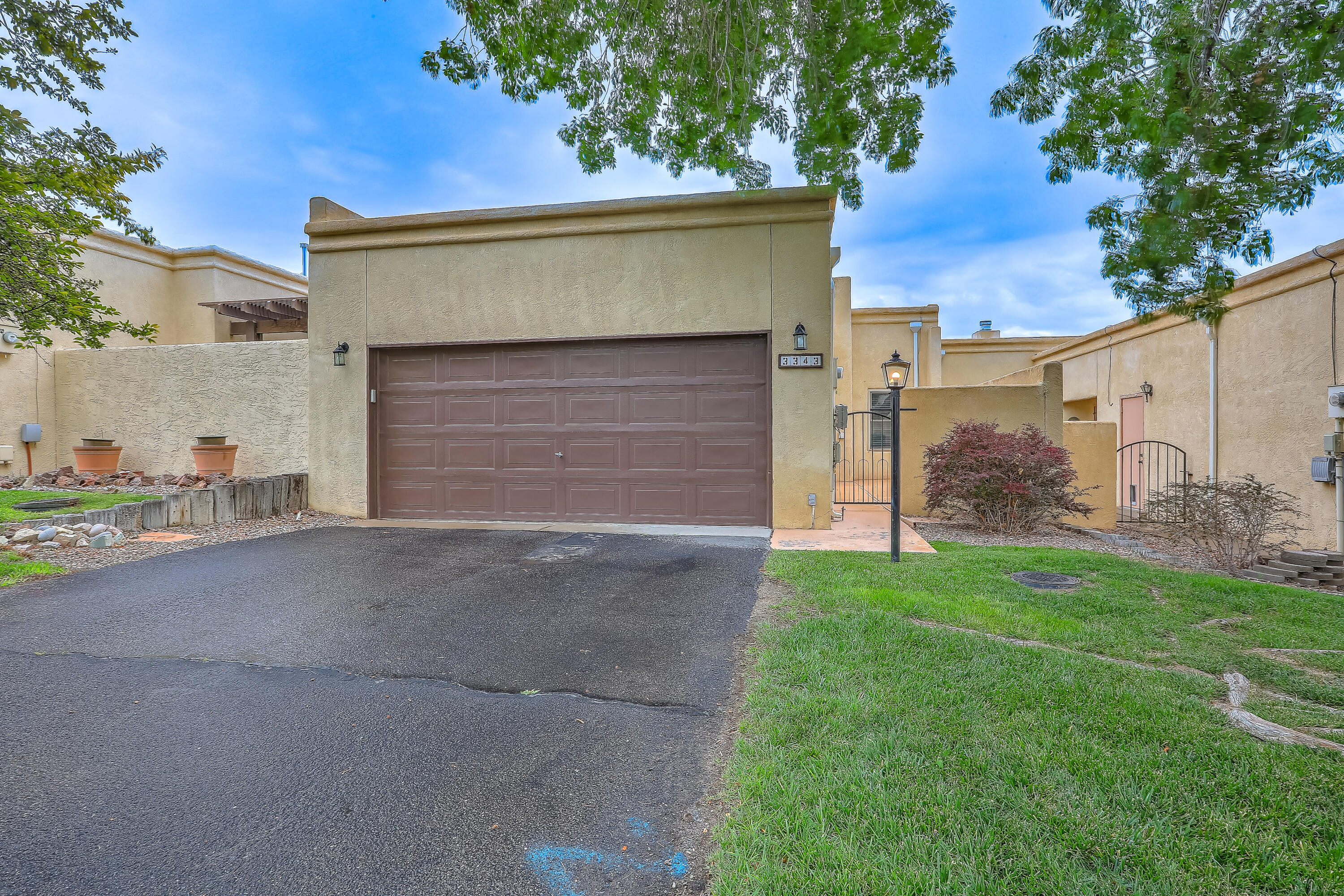 Charming Townhouse in 55+ Community - Rio Rancho, NMWelcome home to this delightful 2-bedroom, 2-bath townhouse nestled in a peaceful and well-maintained 55+ community in beautiful Rio Rancho. This single-level home offers comfort, convenience, and low-maintenance living.Step inside to a bright and inviting living space featuring a cozy gas log fireplace. The spacious primary bedroom includes an en-suite bath. The second bedroom is ideal for guests, a home office, or hobby space.Enjoy a low-maintenance lifestyle with a private patio, attached garage, and access to nearby walking trails and community amenities. Conveniently located near shopping, medical services, and entertainment.