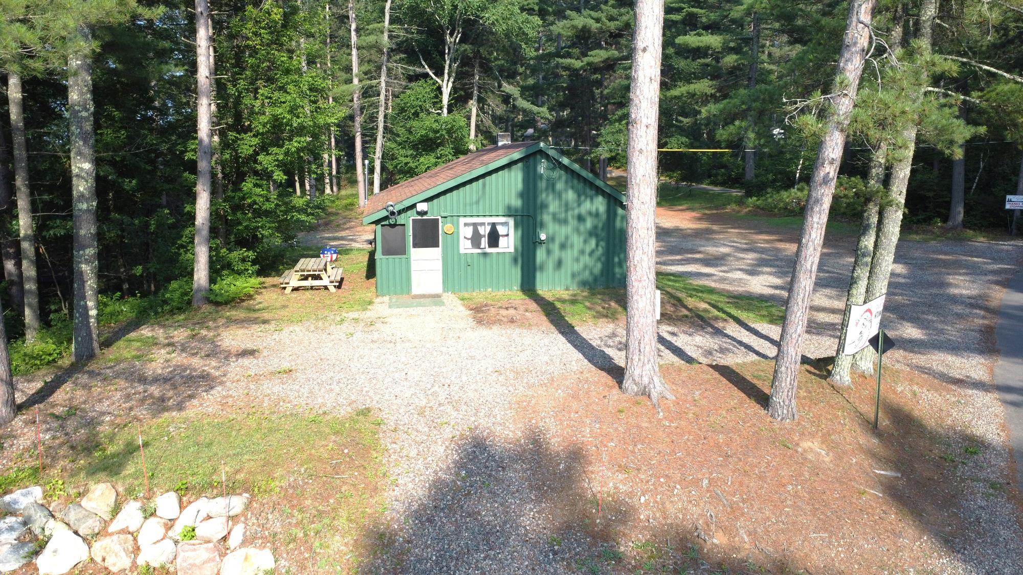 SWAMP LAKE YEAR AROUND CABIN! Charming Year-Round Cabin on Swamp Lake – 2 Acres, Water Frontage & Trail Access! Escape to the great outdoors with this cozy 700 sq ft 3-bedroom, 1-bath cabin nestled on 2 private acres along the peaceful shores of Swamp Lake. With 150 feet of water frontage, this year-round retreat offers incredible access to nature, recreation, and relaxation all year long. Enjoy morning coffee with lake views, afternoons fishing or paddling, and evenings around the fire under the stars. The cabin features a warm, rustic interior with an open living space, kitchen, and room for family and guests. Outdoor enthusiasts will love the easy access to a boat launch, plus direct connection to ATV/UTV and snowmobile trails—making this a four-season haven for adventurers. Whether you're looking for a getaway cabin, a rental opportunity, or a peaceful place to unwind, this lakeside gem delivers. All Data approxiamate, Buyer to verify all data.