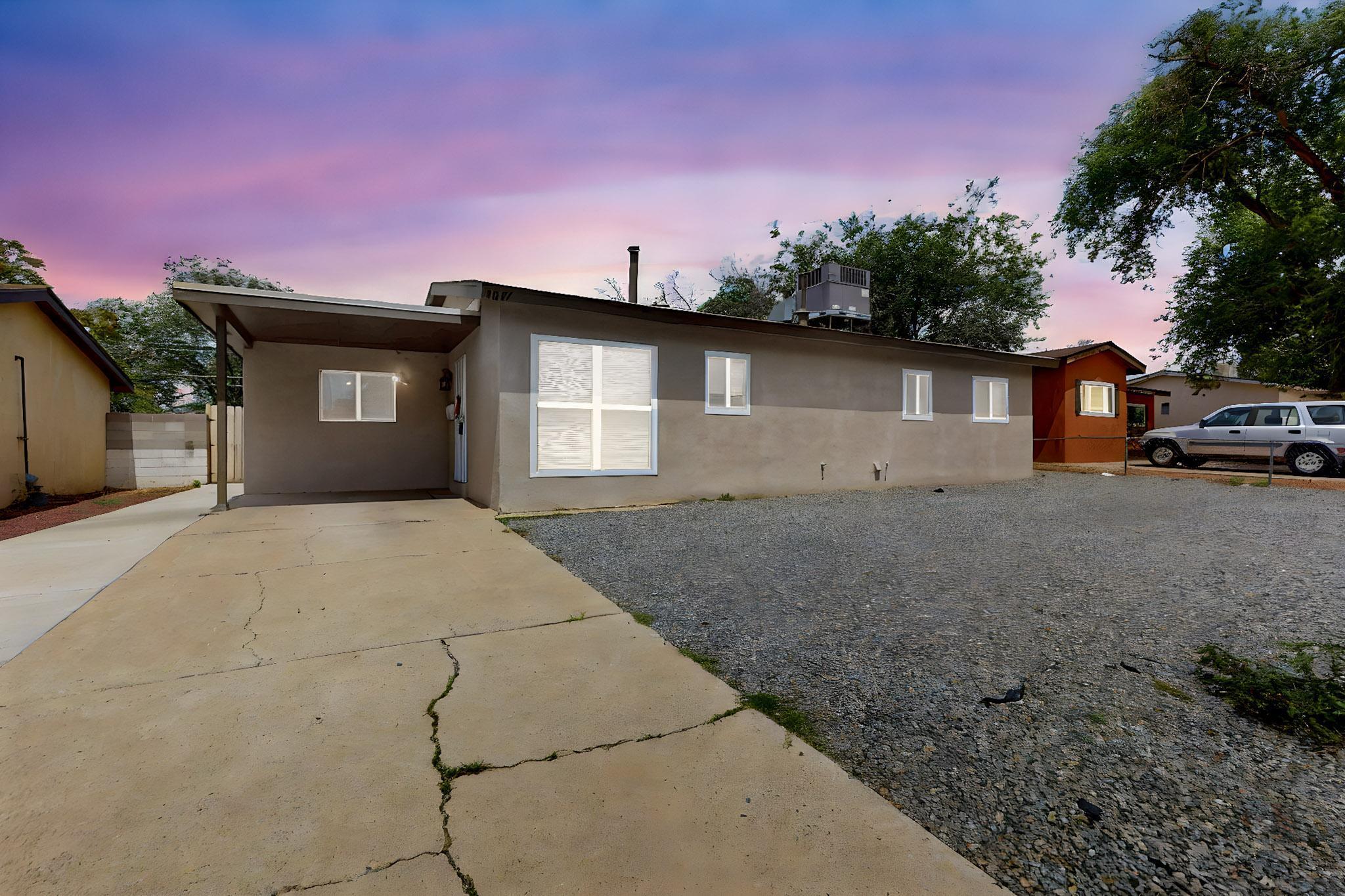 3-bedroom, 1-bath home in the desirable Princess Jeanne neighborhood of the NE Heights! Features include laminate flooring, a landscaped backyard, and cozy wall-mounted fireplaces (included). Major updates include a new A/C unit and TPO roof over the bonus room left of the living room, both installed in 2023. Enjoy easy access to parks, shopping, and freeways. The spacious yard offers room to relax or play. Functional layout makes this a great option for anyone seeking comfort and convenience.Note: Turf, swing set, workbench in shed, small freezer, and washer/dryer DO NOT convey.