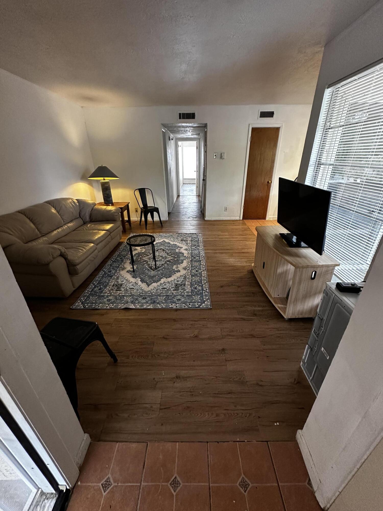 You are cordially invited to come and look at this unique luxury condo close to the heart of Albuquerque. Whether you are a first time homebuyer or an investor, this property has what it takes to move in immediately and create your own personal charming home. This condo is located close to many shopping and entertainment attractions. New updates include fresh paint and reconditioned ac unit blowing cold air along with some other minor upgrades like front screen door replacement and led lighting. Home faces east and looks over a serene part of the neighborhood. Seller is still doing some things to renovate and the home will be completely cleaned before close. Very motivated seller!