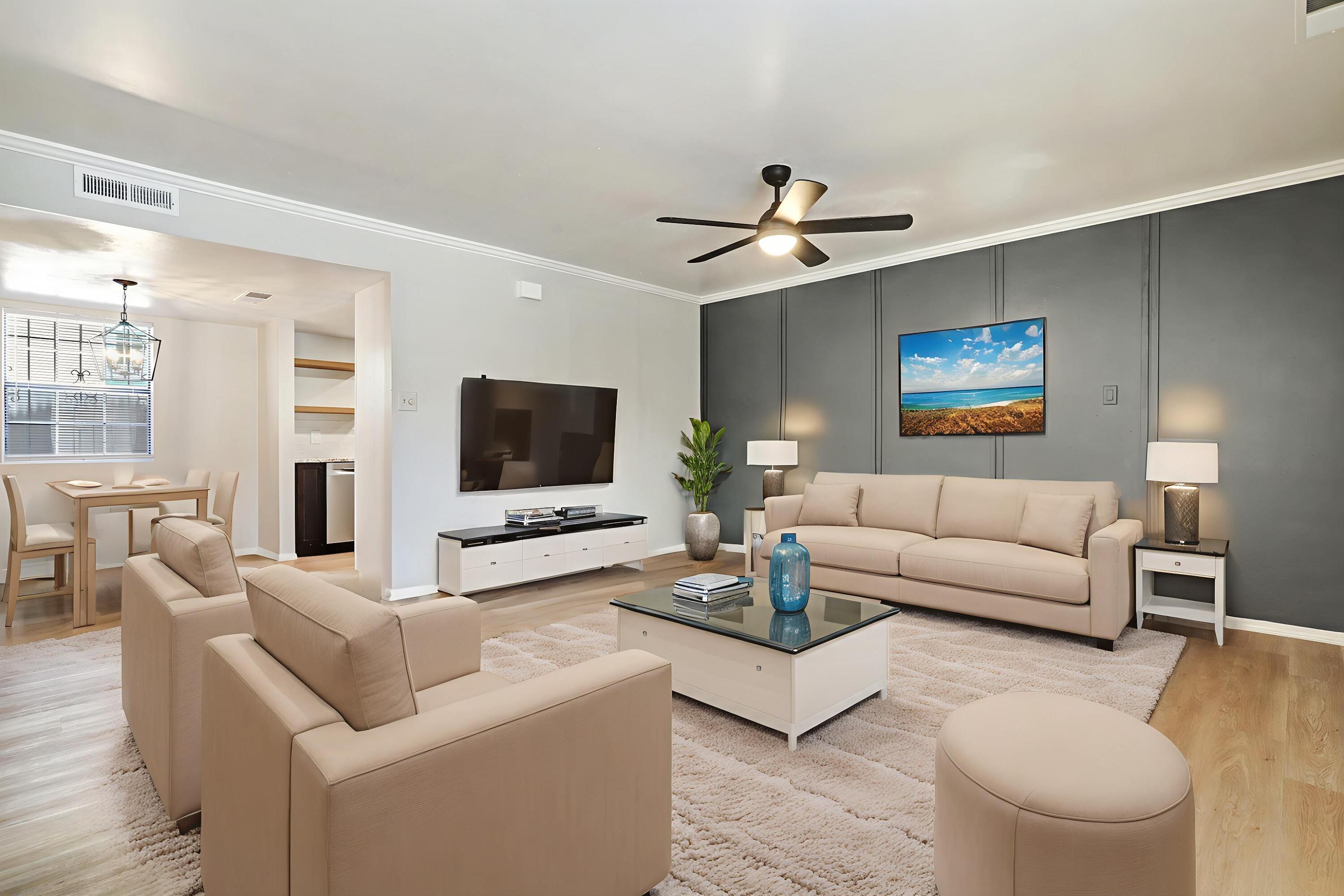 Experience vibrant living in this beautifully updated townhouse just a short drive from Sawmill Market, Old Town, and Downtown Albuquerque. This charming two-bedroom home features a bright, open layout ideal for both relaxing and entertaining. The living area boasts a stylish accent wall, and the remodeled kitchen includes granite countertops, stainless steel appliances, upgraded cabinetry, and generous workspace. Bathrooms have been tastefully renovated, with new flooring, fresh paint, and updated fixtures throughout. Enjoy easy, low-maintenance living in a central, convenient location near shops, restaurants, parks, museums, and so much more. Immerse yourself in the culture, flavor, and vibrant rhythm of the city--just steps from your door.