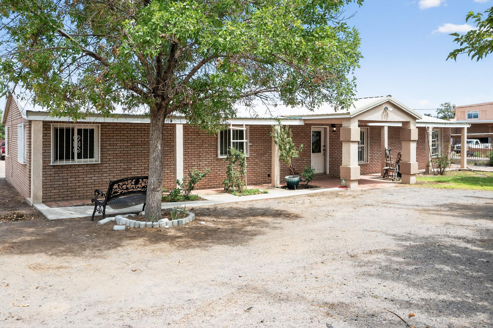 Enjoy Nearly to 2 Acres Of Peaceful Country Living! This  move-in ready Home Offers The Best Of Rural Charm and Modern Comfort . Featuring  Solar Panels and Refrigerated air for Year-Round Climate Control. With Plenty Of Space For Horses, Chickens, Goats and More... It's Perfect for Those Looking to Live the Homestead Lifestyle. Mature Trees Provide Abundant Shade while the Quiet Country Setting is Just a Short Drive From City Conveniences.