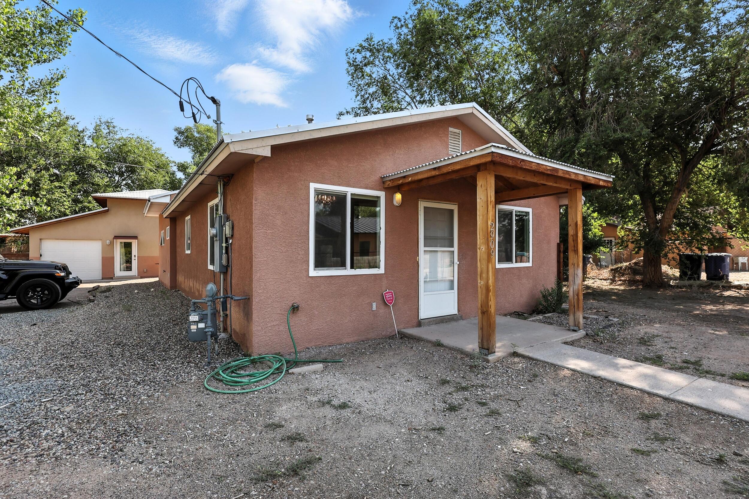 : Hidden Gem Minutes from Old Town - Investment Property with Turn-Key Airbnb Casita. Welcome to this incredible opportunity tucked away in a quiet, desirable neighborhood just minutes from the charm and culture of Old Town Albuquerque. This unique property features a spacious 3 bedroom, 2-bath main home and a fully furnished, active Airbnb casita--ideal for investors, multi-generational living, or anyone looking to generate passive income. Main House Highlights: Primary suite with attached bath. Recently updated with new carpet, tile showers, and a new evaporative cooler. Open layout perfect for comfortable living or entertaining Casita Features: One-bedroom loft-style guest house with private entrance. Includes a 1-car garage. Currently a successful Airbnb rental--fully furnished.