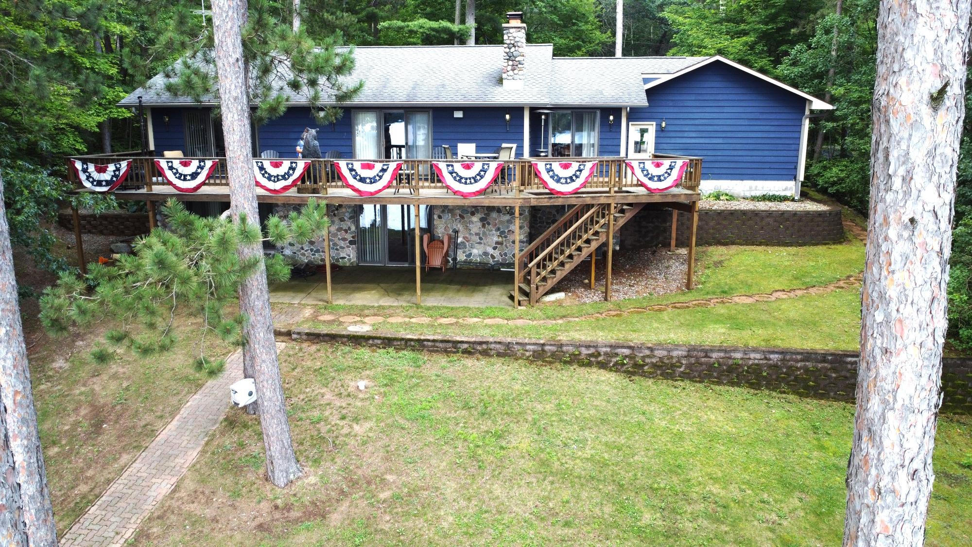 Rare Deer Lake Opportunity! Don’t miss this rare opportunity to own a beautifully maintained home on highly sought-after Deer Lake, part of the pristine Nokomis Chain. This spacious 3-bedroom, 3-bath home with an office offers 3,000 sq ft of comfortable living space, perfect as a year-round residence or a serene Northwoods getaway. Step inside to find two cozy fireplaces, ideal for chilly evenings, and large windows that frame picturesque views of the lake. The home’s layout includes a dedicated office space, perfect for working remotely or converting into a guest room. Outside, you'll love the expansive deck, perfect for entertaining, relaxing, or simply enjoying the peaceful setting. The property is surrounded by mature trees for privacy and natural beauty, and the turnaround driveway adds convenience and ease of access. A 2-car attached garage completes the package. With direct access to the Nokomis Chain, you’ll enjoy boating, fish swimming, and snowmobiling right from door. All data approximate, Buyer to verify all data.